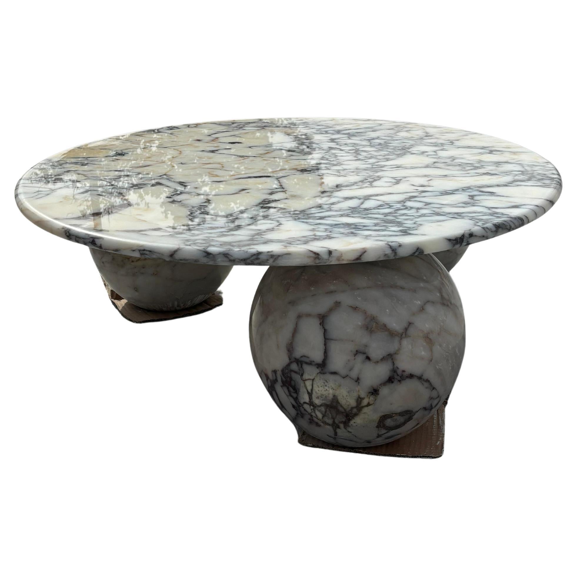 https://a.1stdibscdn.com/italian-calacatta-viola-stone-marble-handmade-living-room-coffee-table-for-sale-picture-2/f_91932/f_454243821749733373760/f_45424382_1749733374331_bg_processed.jpg