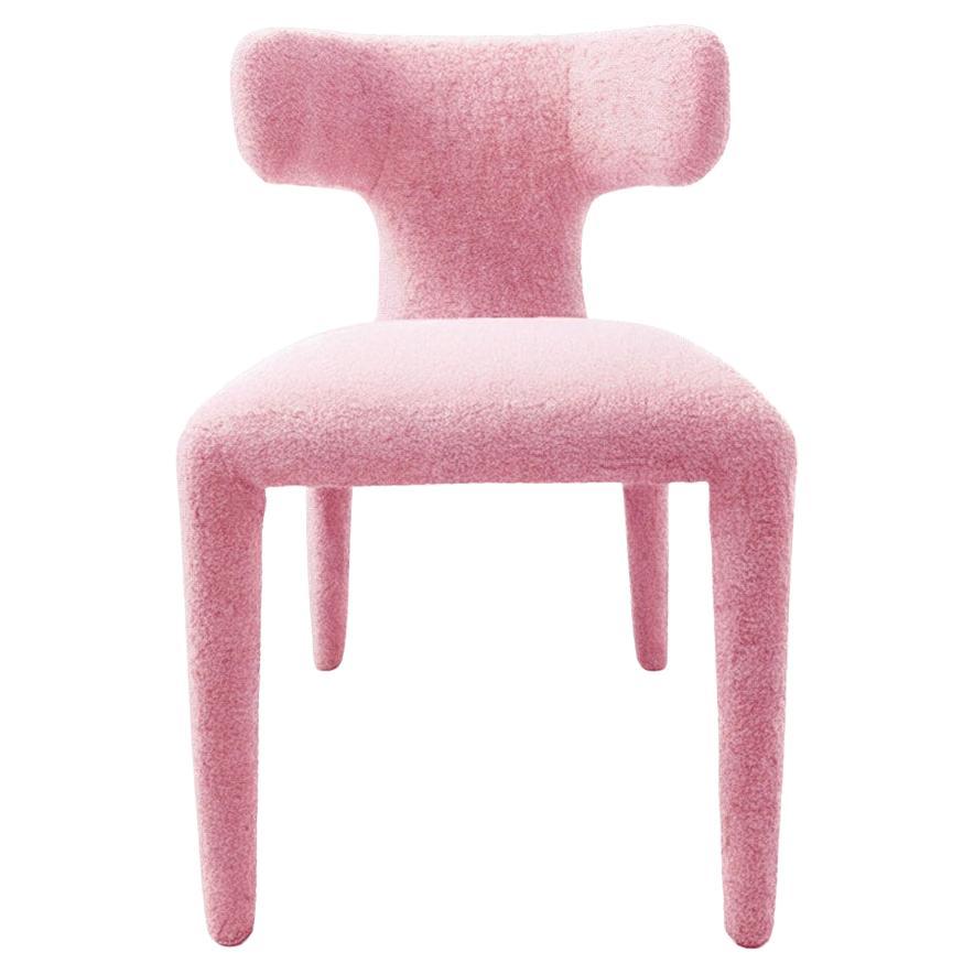 https://a.1stdibscdn.com/instinto-dining-chair-pink-boucle-for-sale/f_105132/f_456645021751278680686/f_45664502_1751278680850_bg_processed.jpg