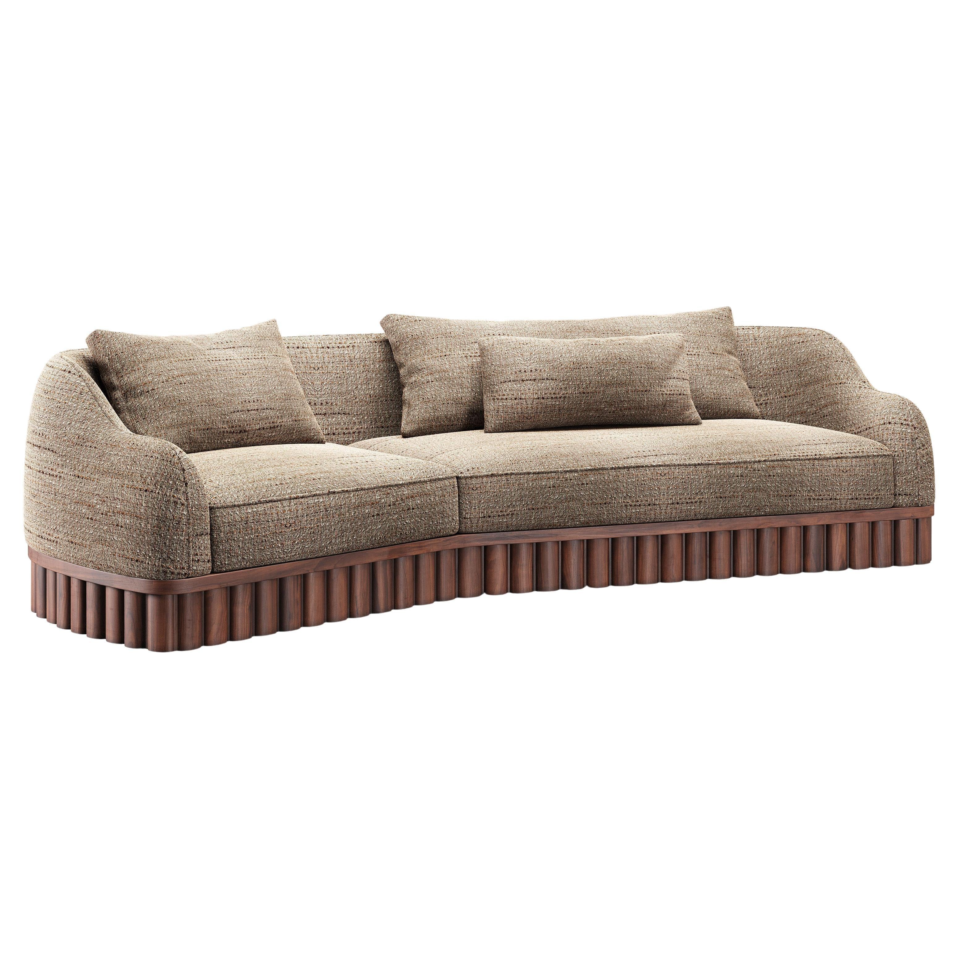 https://a.1stdibscdn.com/ripple-sofa-angular-curved-silhouette-with-sculptural-carved-wood-base-for-sale/f_27693/f_456750821751342694984/f_45675082_1751342696181_bg_processed.jpg