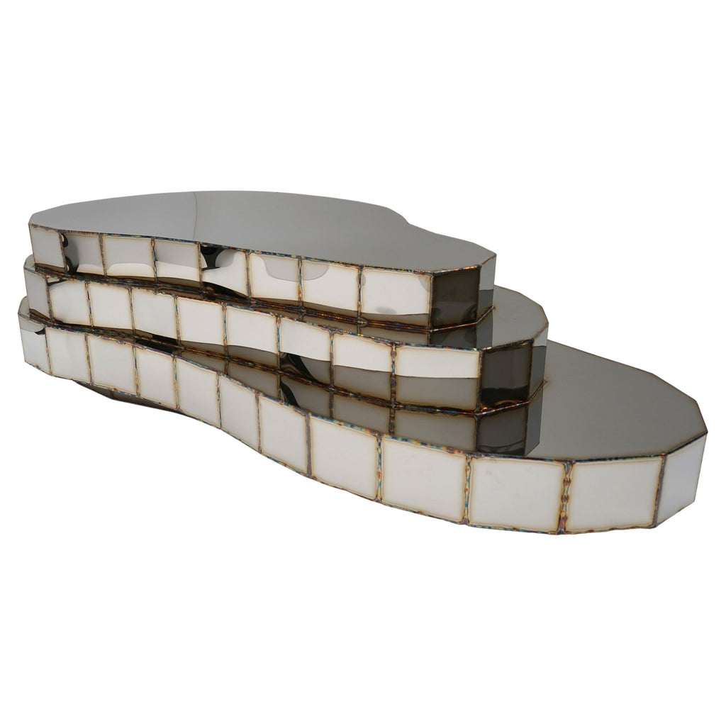 https://a.1stdibscdn.com/steppe-low-table-in-welded-mirror-polished-stainless-steel-by-julian-mayor-for-sale/f_12192/f_459856521753281604372/f_45985652_1753281605145_bg_processed.jpg