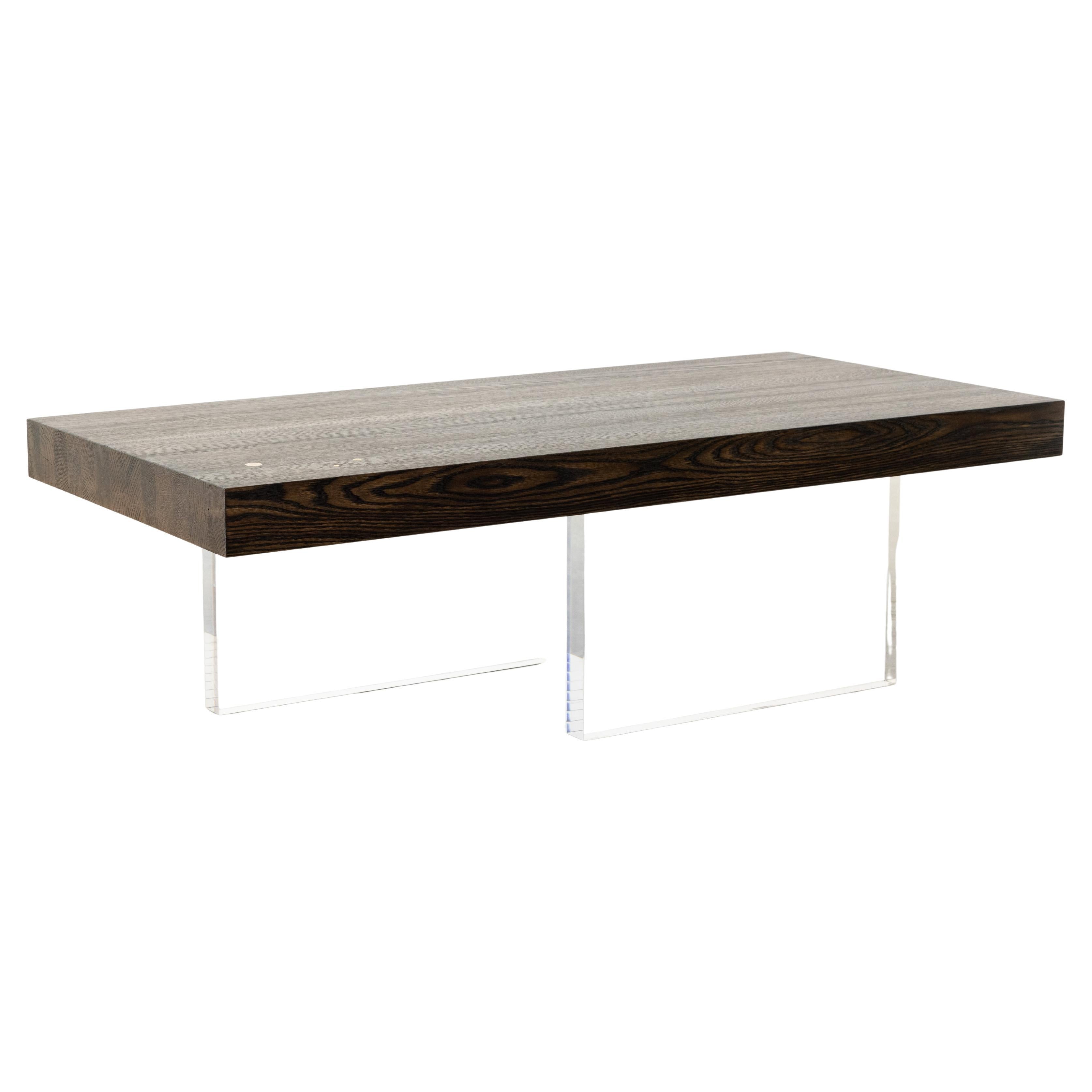 https://a.1stdibscdn.com/constantinople-torched-oak-rectangle-acrylic-floating-coffee-table-for-sale/f_77532/f_461205021754177047579/f_46120502_1754177048537_bg_processed.jpg