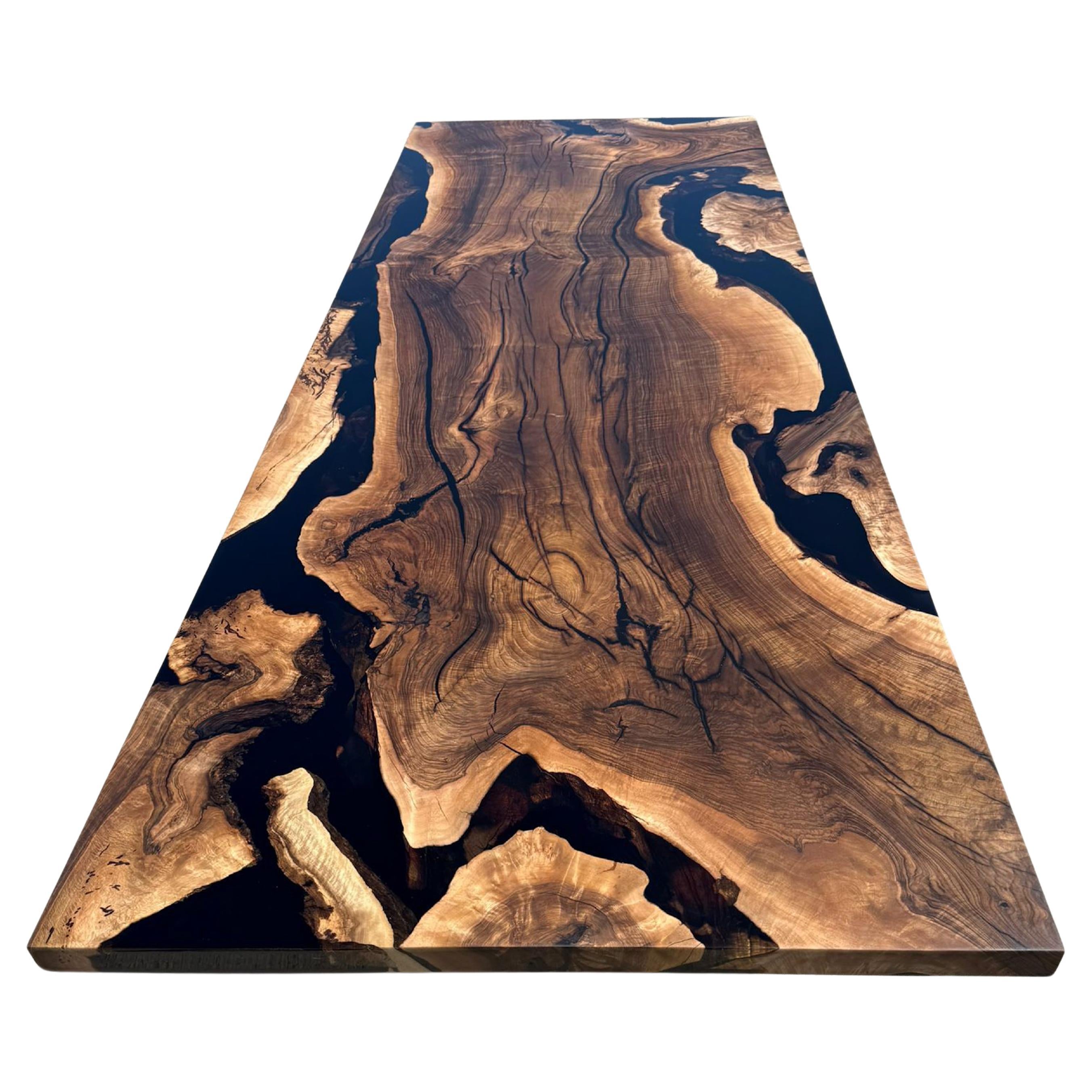 https://a.1stdibscdn.com/black-resin-walnut-wood-dining-room-table-custom-wooden-table-for-sale/f_91932/f_461369921754317336326/f_46136992_1754317337363_bg_processed.jpg