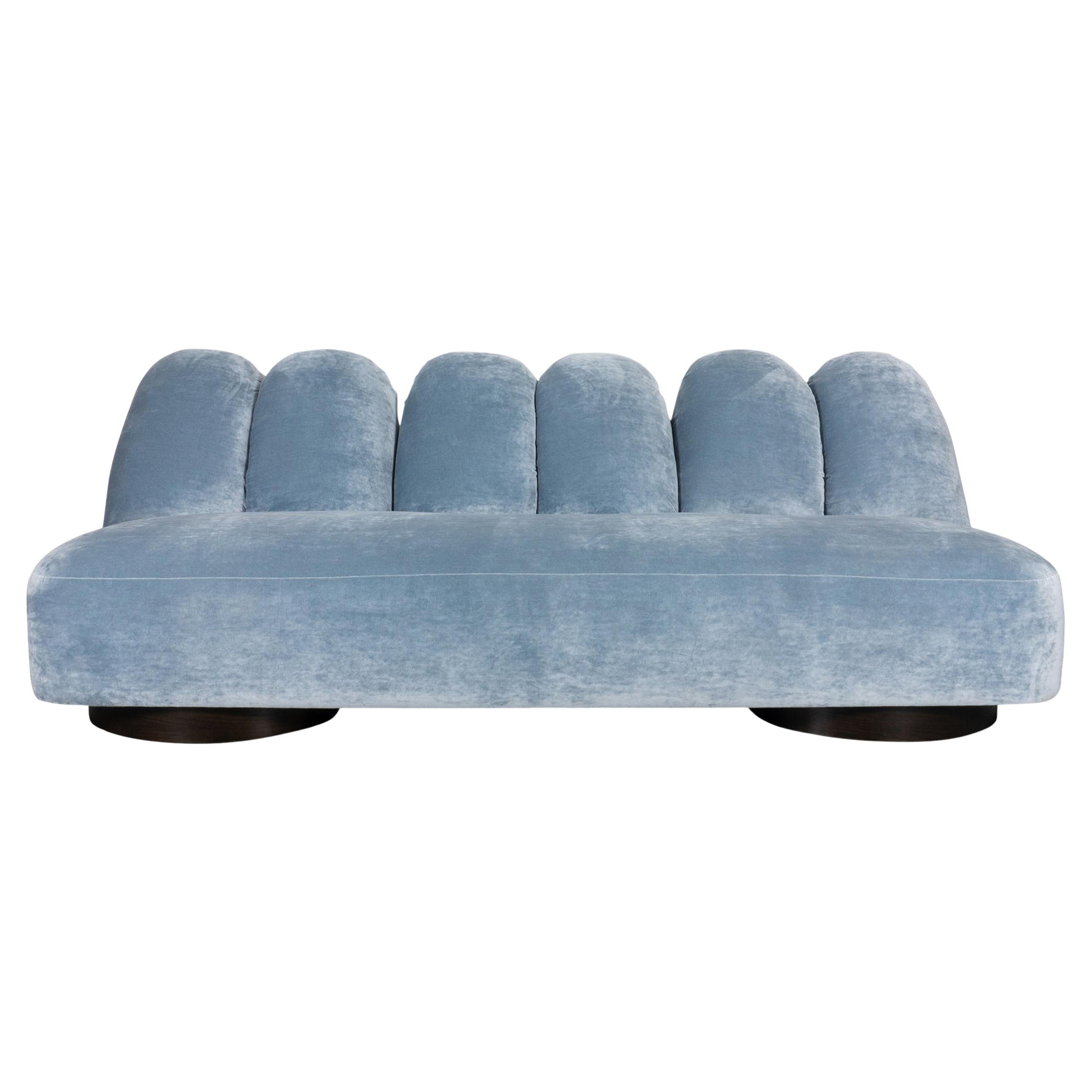 https://a.1stdibscdn.com/avant-garde-sofa-with-jumbo-channel-back-in-light-blue-crushed-velvet-for-sale/f_21233/f_461511021754409002294/f_46151102_1754409003030_bg_processed.jpg
