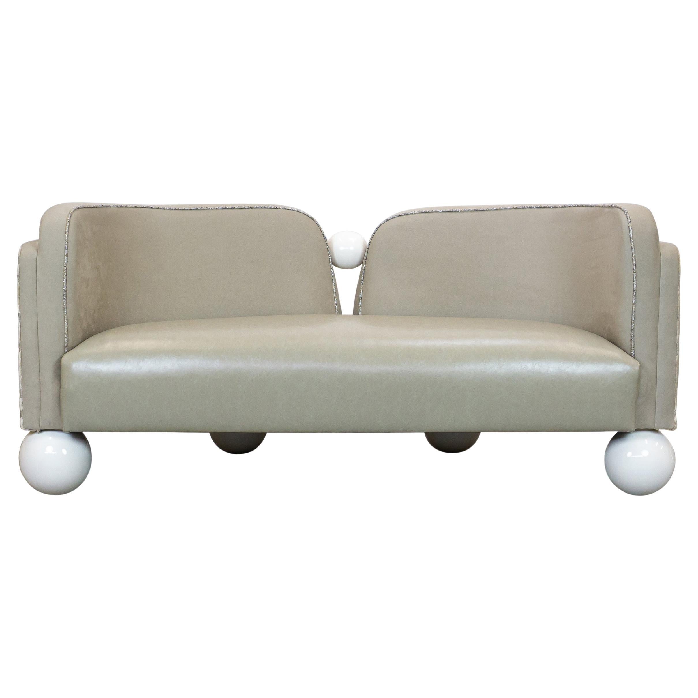 https://a.1stdibscdn.com/tete-a-tete-style-sofa-with-art-deco-influence-and-pearl-like-feet-for-sale/f_21233/f_461512421754409516923/f_46151242_1754409517683_bg_processed.jpg