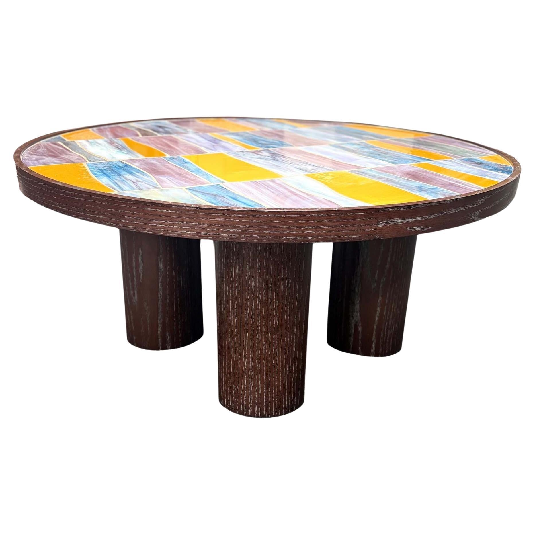 https://a.1stdibscdn.com/modern-round-coffee-table-with-glass-top-and-oak-pedestal-base-by-ercole-home-for-sale/f_42371/f_461690921754513159714/f_46169092_1754513160251_bg_processed.jpg