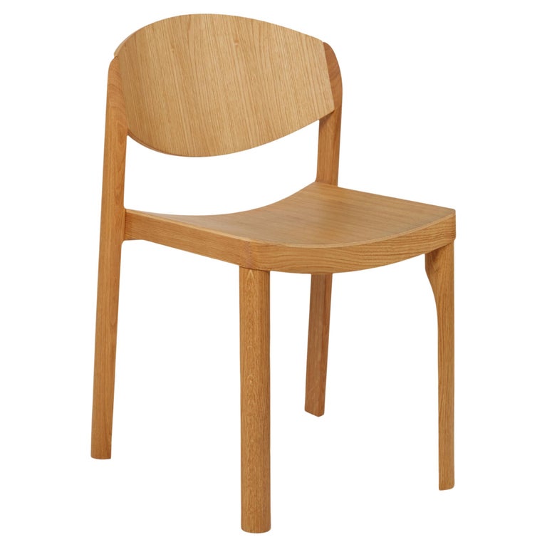 https://a.1stdibscdn.com/mauro-pasquinelli-mauro-wood-dining-chair-in-oak-for-established-sons-for-sale/f_14472/f_462272721754941220954/f_46227272_1754941222154_bg_processed.jpg?width=768