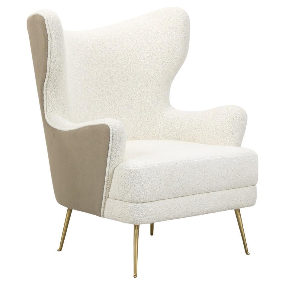 https://a.1stdibscdn.com/playful-sculptural-armchair-with-winged-back-and-slim-tapered-brass-legs-for-sale-picture-2/f_27693/f_462805621755242096892/f_46280562_1755242097143_bg_processed.jpg