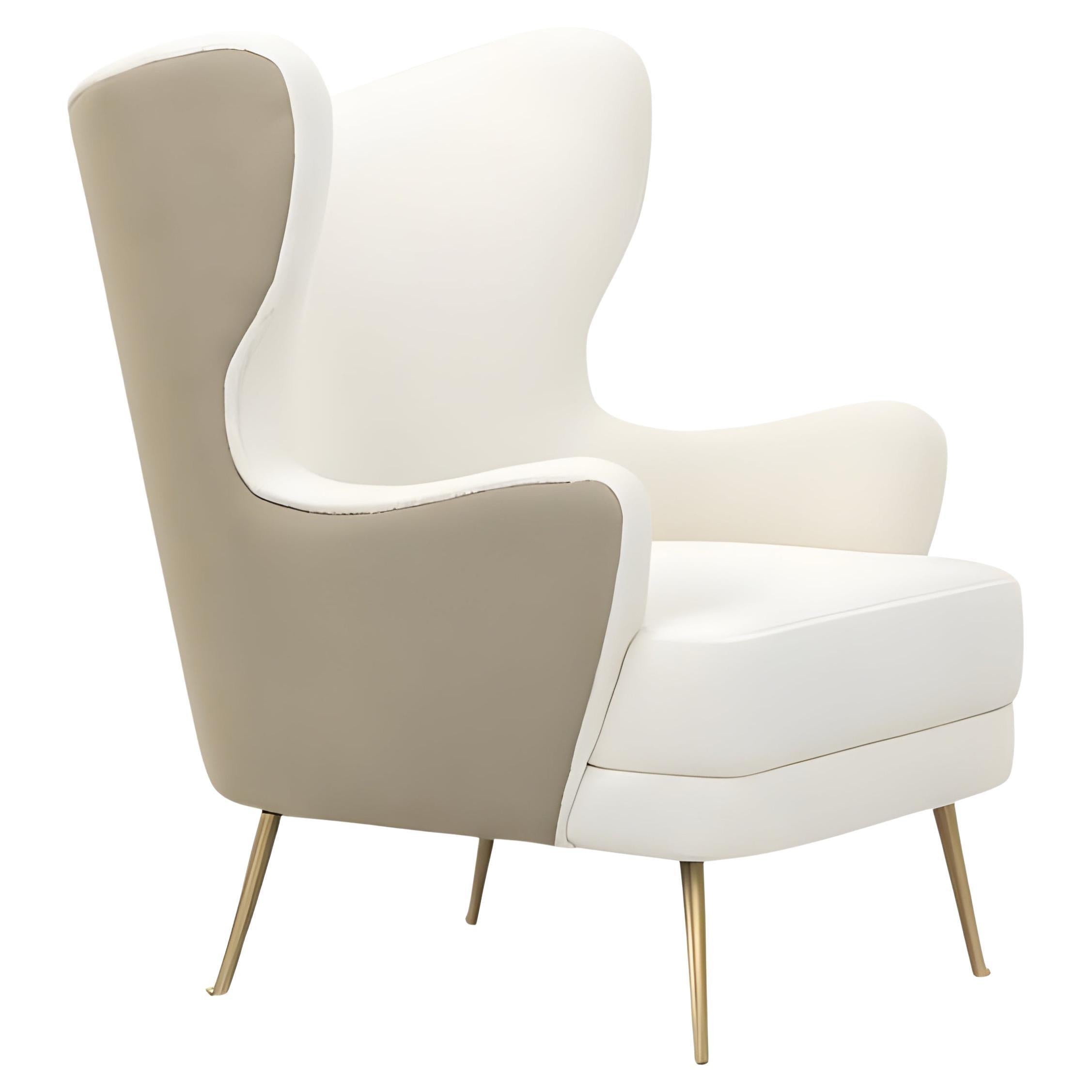 https://a.1stdibscdn.com/sculptural-armchair-with-winged-back-and-slim-tapered-brass-legs-by-jose-castro-for-sale/f_27693/f_462805621763974758528/f_46280562_1763974759063_bg_processed.jpg
