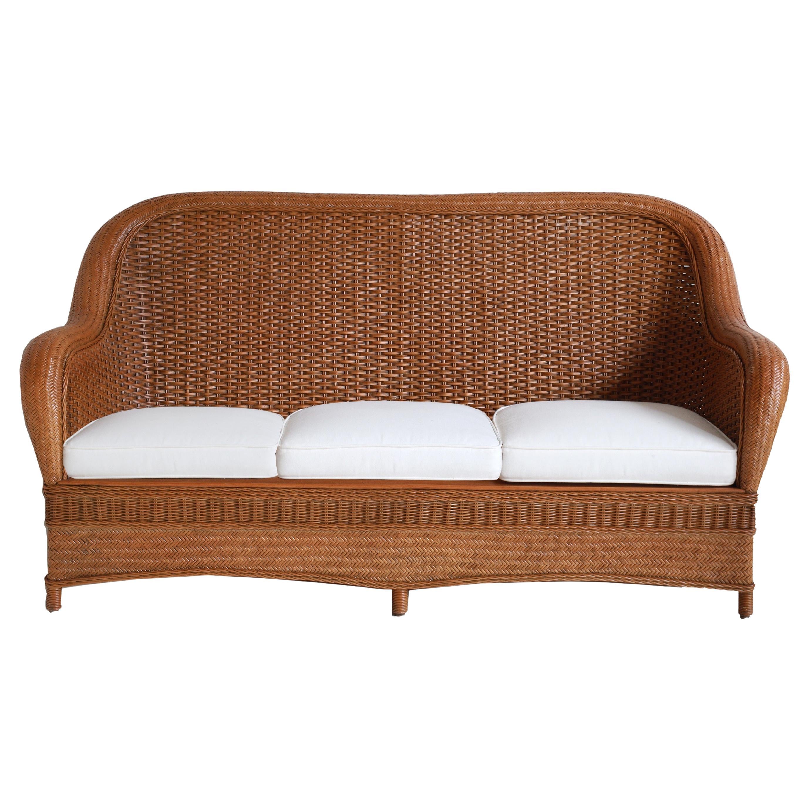 https://a.1stdibscdn.com/porto-cervo-rattan-sofa-for-sale/f_97912/f_463328221755616962995/f_46332822_1755616964113_bg_processed.jpg