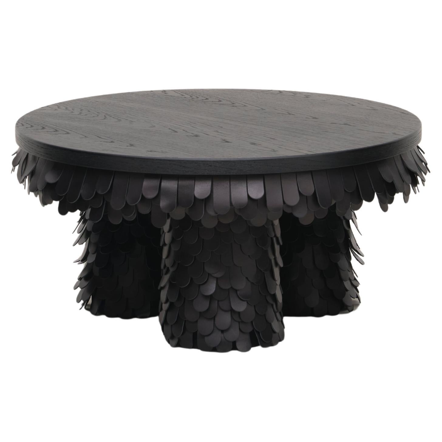 https://a.1stdibscdn.com/round-textured-organic-black-leather-and-wood-coffee-table-for-sale/f_19173/f_464281921756289929222/f_46428192_1756289929556_bg_processed.jpg