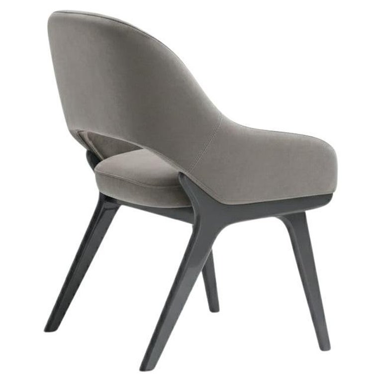 https://a.1stdibscdn.com/1950s-style-velvet-dining-chair-with-open-back-by-carlos-soriano-for-sale/f_27693/f_465368521759867395646/f_46536852_1759867395771_bg_processed.jpg?width=768