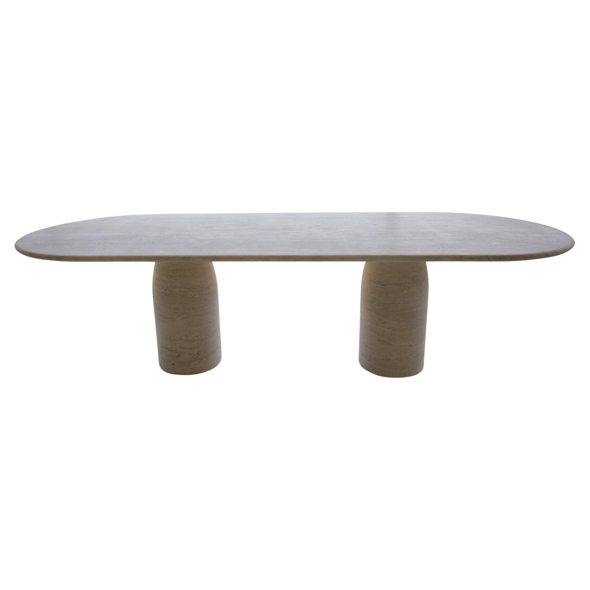 https://a.1stdibscdn.com/large-travertine-oval-dining-table-with-bullet-shape-legs-by-my-habitat-design-for-sale/f_80522/f_465588821757180306418/f_46558882_1757180306775_bg_processed.jpg