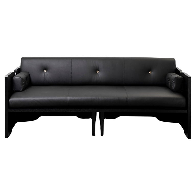 https://a.1stdibscdn.com/perfidia-3-seater-sofa-in-ebano-wood-leather-aged-brass-by-estudio-andean-for-sale/f_12192/f_468714421759251632523/f_46871442_1759251632964_bg_processed.jpg?width=768