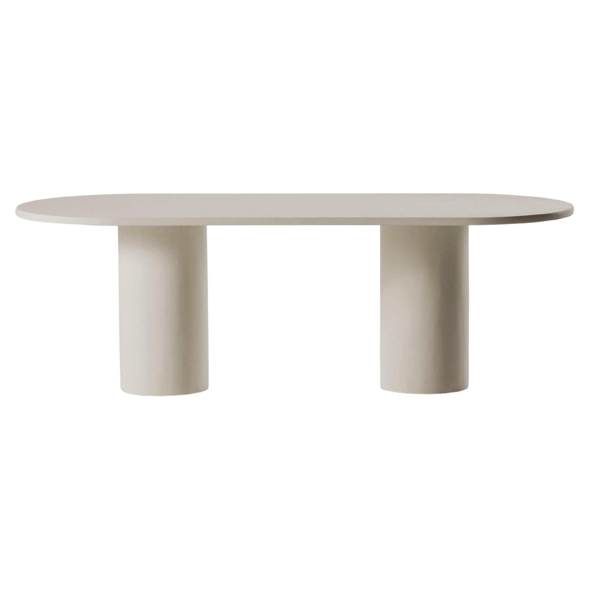 https://a.1stdibscdn.com/reye-microcement-dining-table-by-marlot-baus-for-sale/f_106442/f_469050221759477788306/f_46905022_1759477788678_bg_processed.jpg