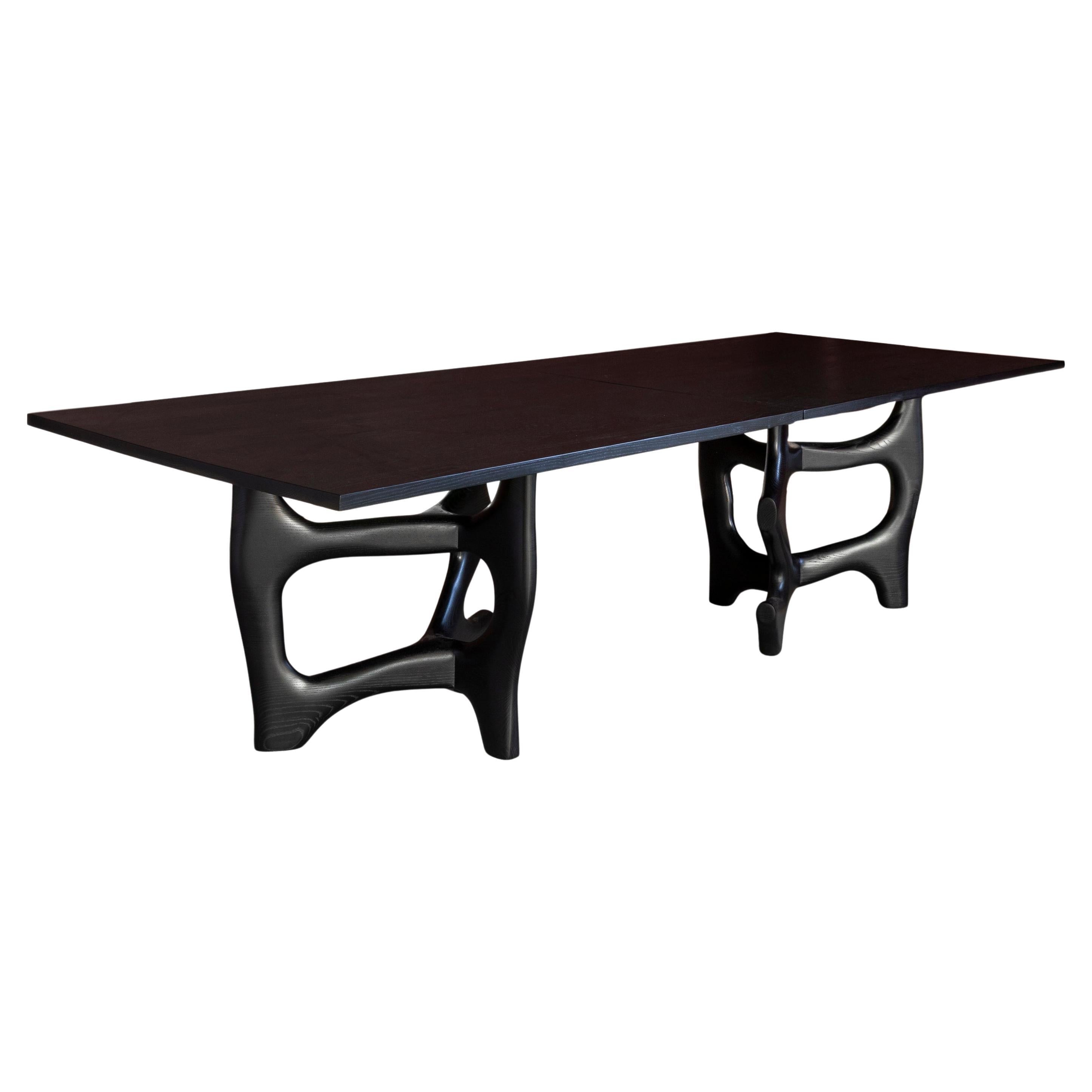 https://a.1stdibscdn.com/hand-carved-double-dining-table-for-sale/f_8976/f_469132821759506679692/f_46913282_1759506680443_bg_processed.jpg