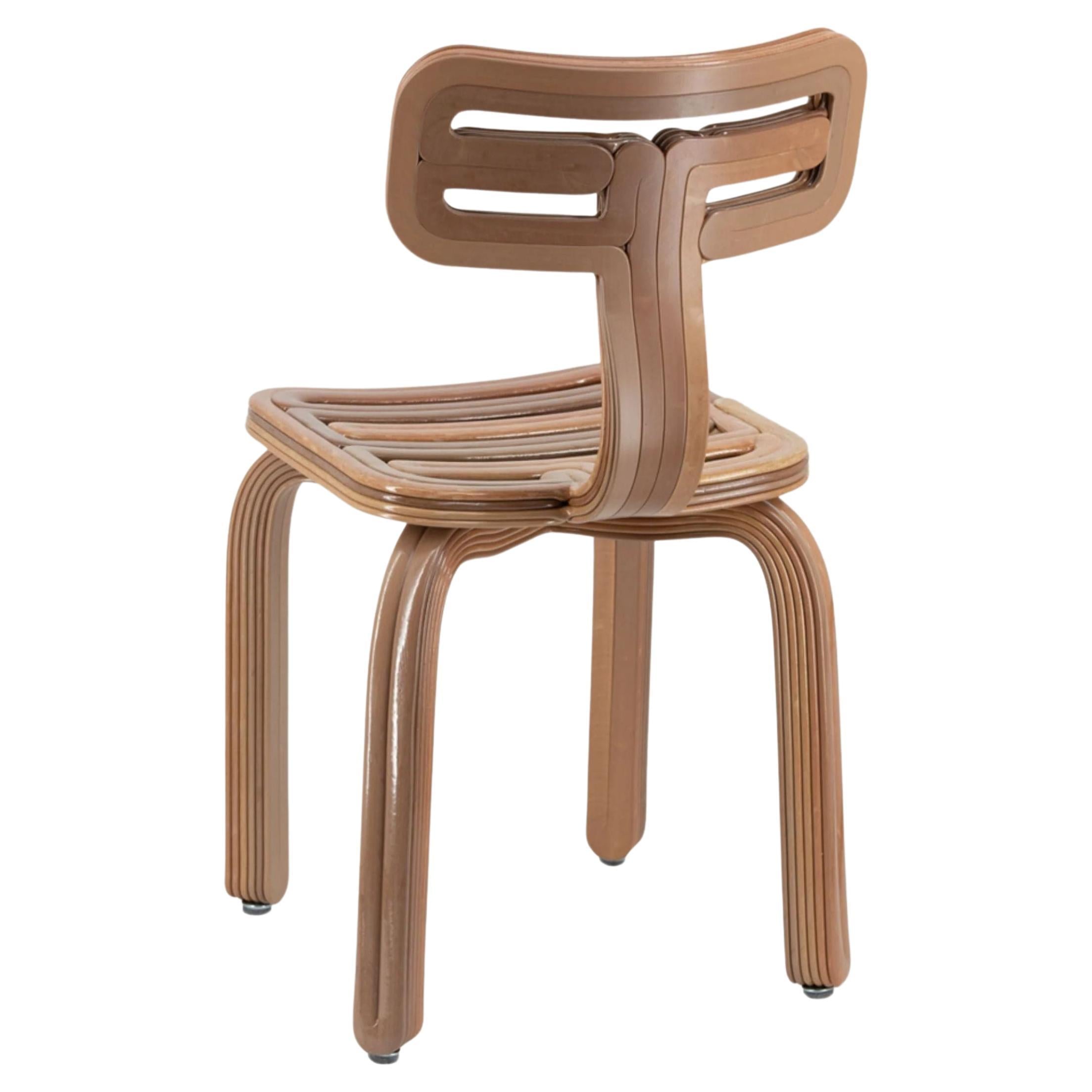 https://a.1stdibscdn.com/kooij-chubby-chair-in-tannin-by-dirk-van-der-kooij-for-sale-picture-2/f_105062/f_469214121759538545470/f_46921412_1759538546053_bg_processed.jpg
