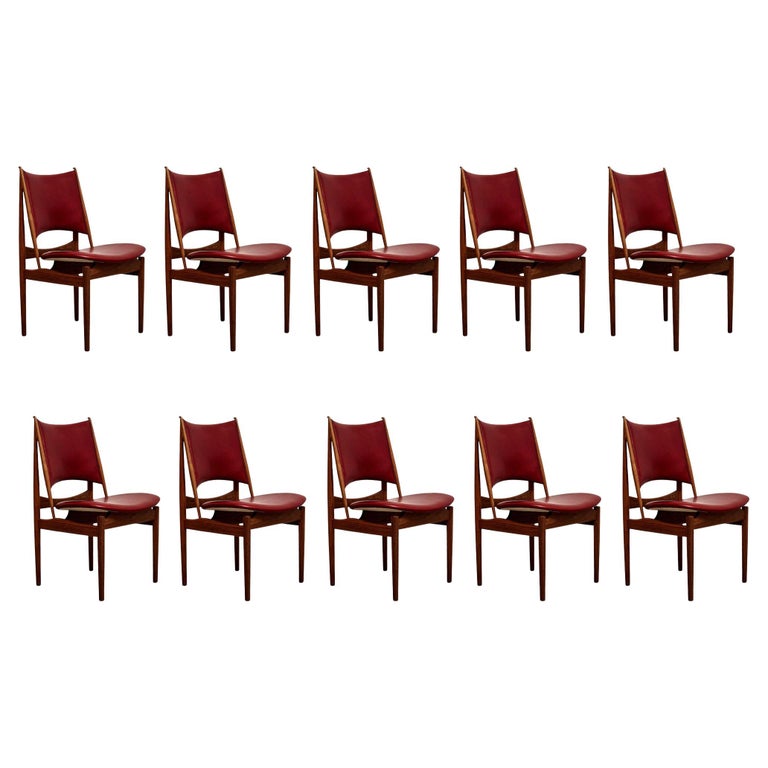 https://a.1stdibscdn.com/set-of-10-finn-juhl-egyptian-chair-in-walnut-wood-and-dark-red-leather-for-sale/f_14272/f_469773821760011944754/f_46977382_1760011945303_bg_processed.jpg?width=768