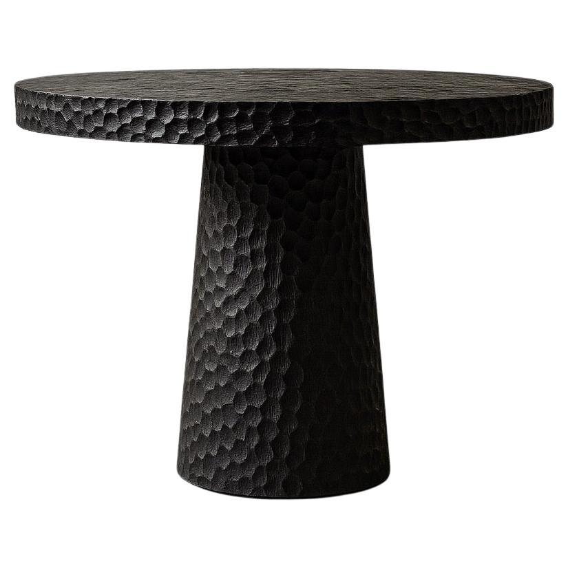 https://a.1stdibscdn.com/round-solid-oak-dining-table-with-hand-carved-texture-in-black-by-sergio-vulpe-for-sale/f_99712/f_470344121760401164764/f_47034412_1760401164957_bg_processed.jpg