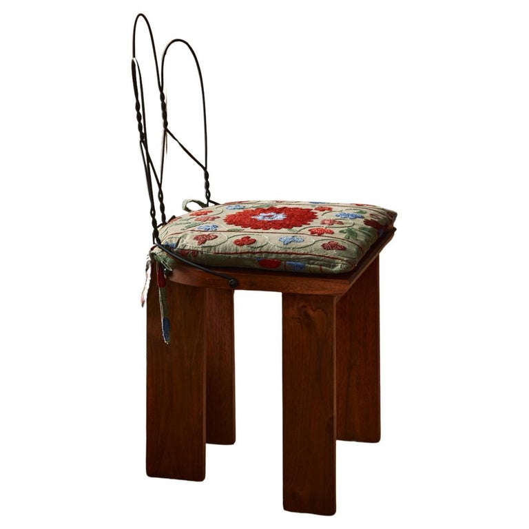 https://a.1stdibscdn.com/akar-chair-in-blackened-steel-oiled-teak-with-cushion-by-evam-for-sale/f_12192/f_470579521760550033987/f_47057952_1760550034251_bg_processed.jpg?width=768