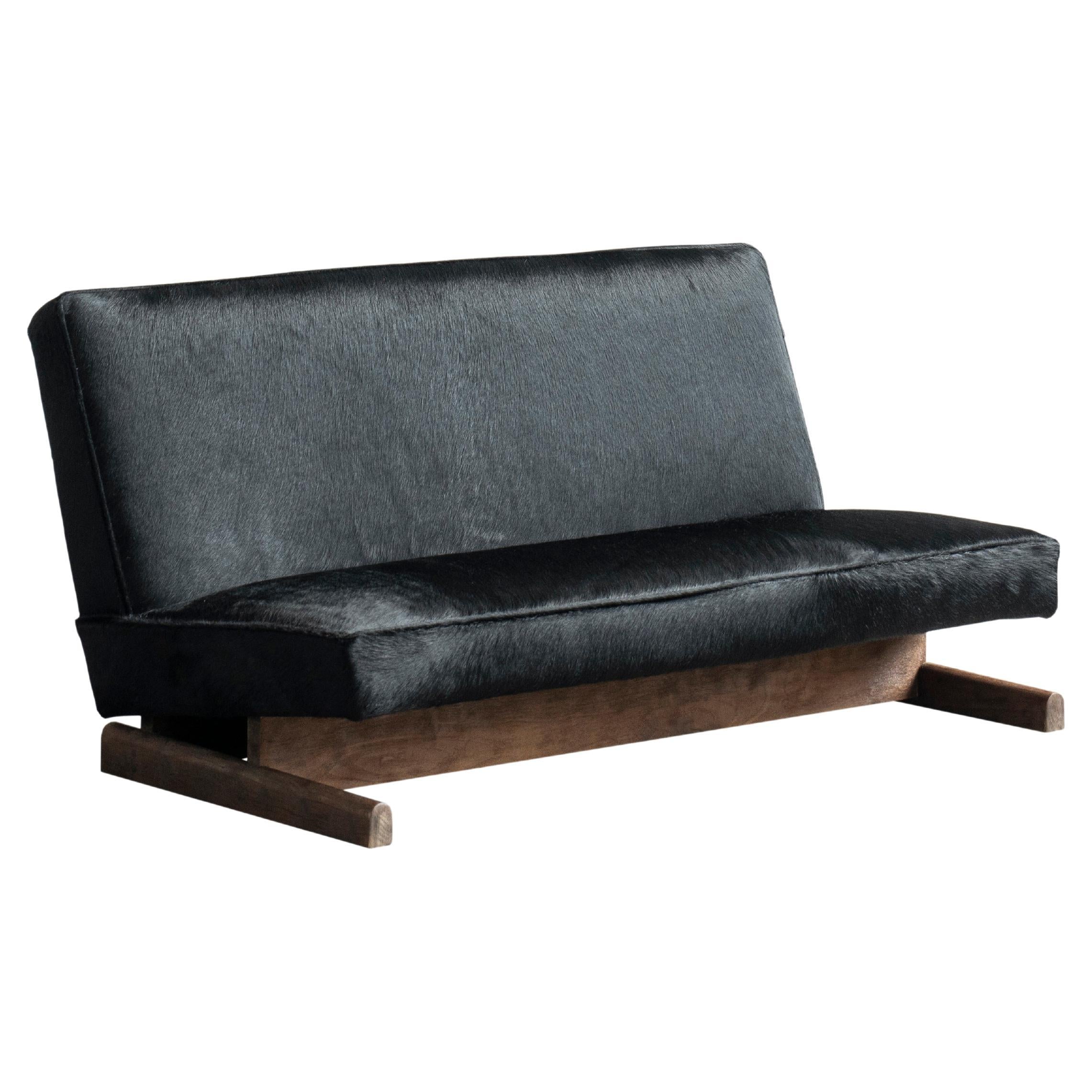 https://a.1stdibscdn.com/ut-02-cowhide-and-walnut-sofa-by-sing-chan-for-sale/f_12192/f_472363421761589693629/f_47236342_1761589694502_bg_processed.jpg