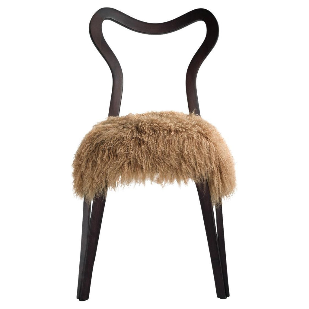 https://a.1stdibscdn.com/daina-tibet-lamb-fur-dining-chair-in-solid-walnut-by-nigel-coates-for-sale/f_46131/f_474025121762419226430/f_47402512_1762419226578_bg_processed.jpg