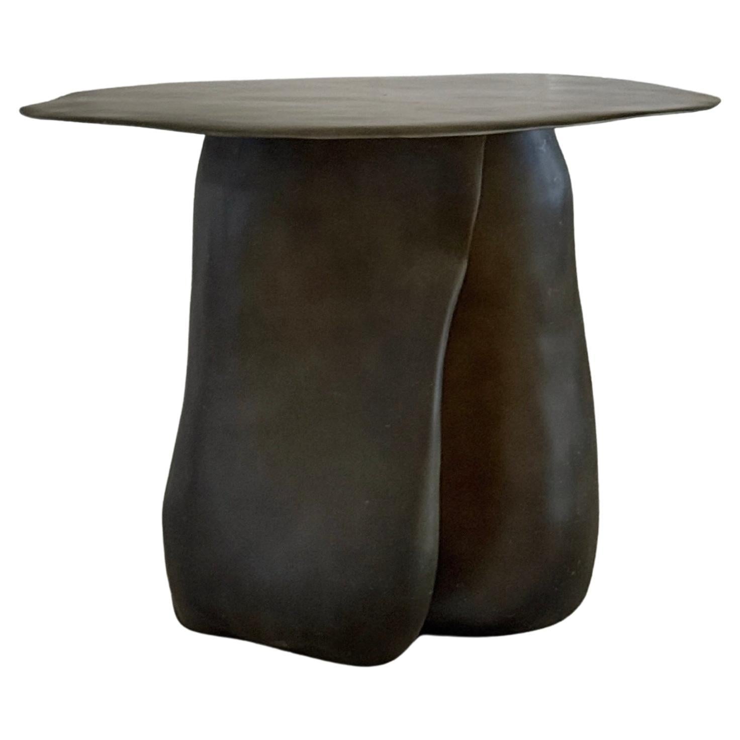 https://a.1stdibscdn.com/moss-brown-formless-fiberglass-round-table-by-kar-for-sale/f_12192/f_476237721763592679906/f_47623772_1763592680231_bg_processed.jpg