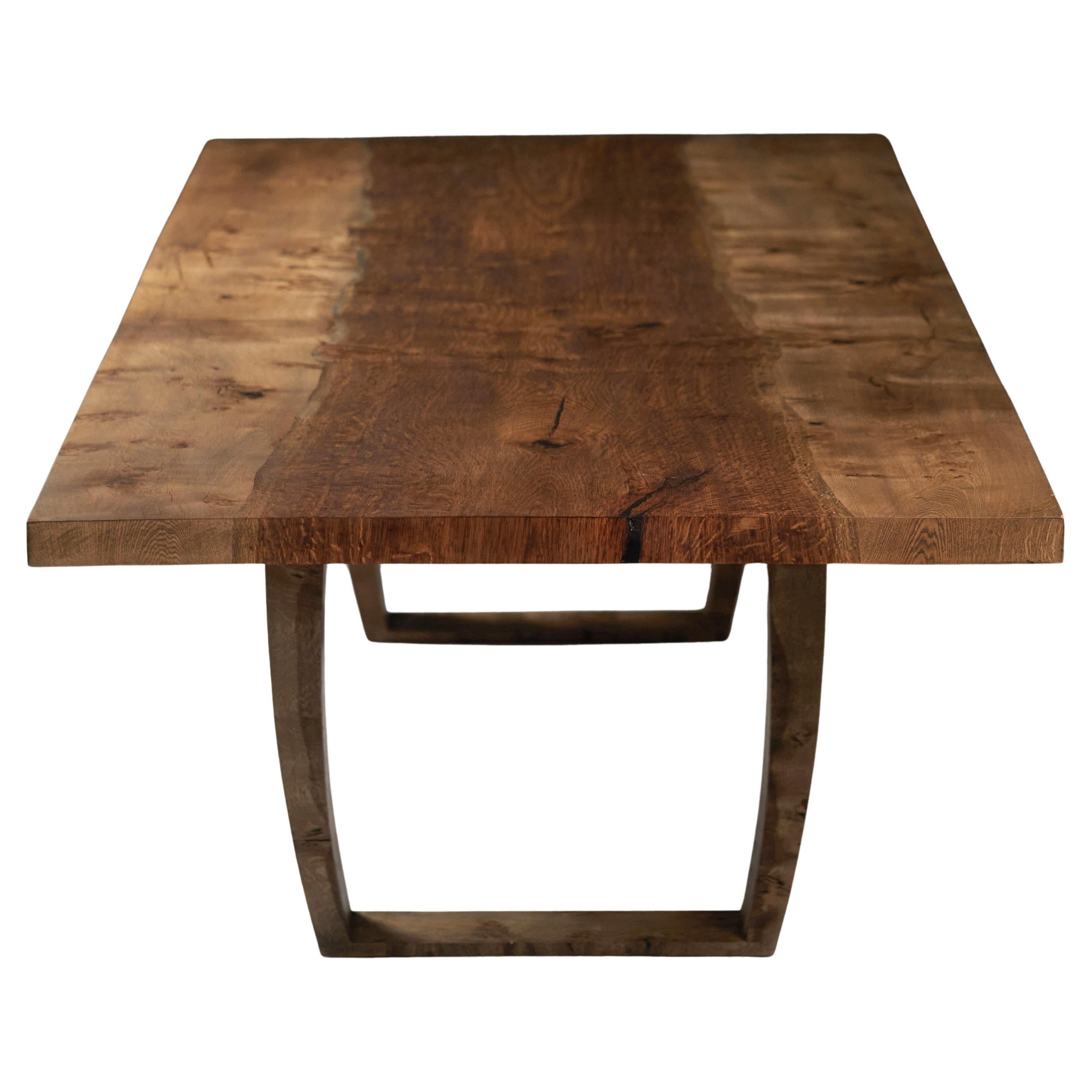 https://a.1stdibscdn.com/extendable-oak-table-with-central-brown-oak-inset-top-by-jonathan-field-for-sale/f_28993/f_476698921763924838197/f_47669892_1763924839147_bg_processed.jpg