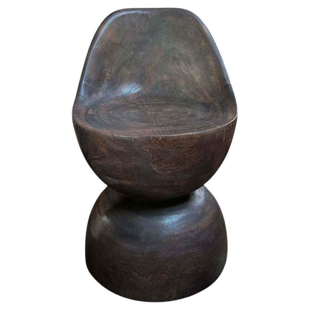 https://a.1stdibscdn.com/sculptural-chair-carved-from-solid-suar-wood-modern-organic-espresso-finish-for-sale/f_58812/f_477196221764165036072/f_47719622_1764165036320_bg_processed.jpg