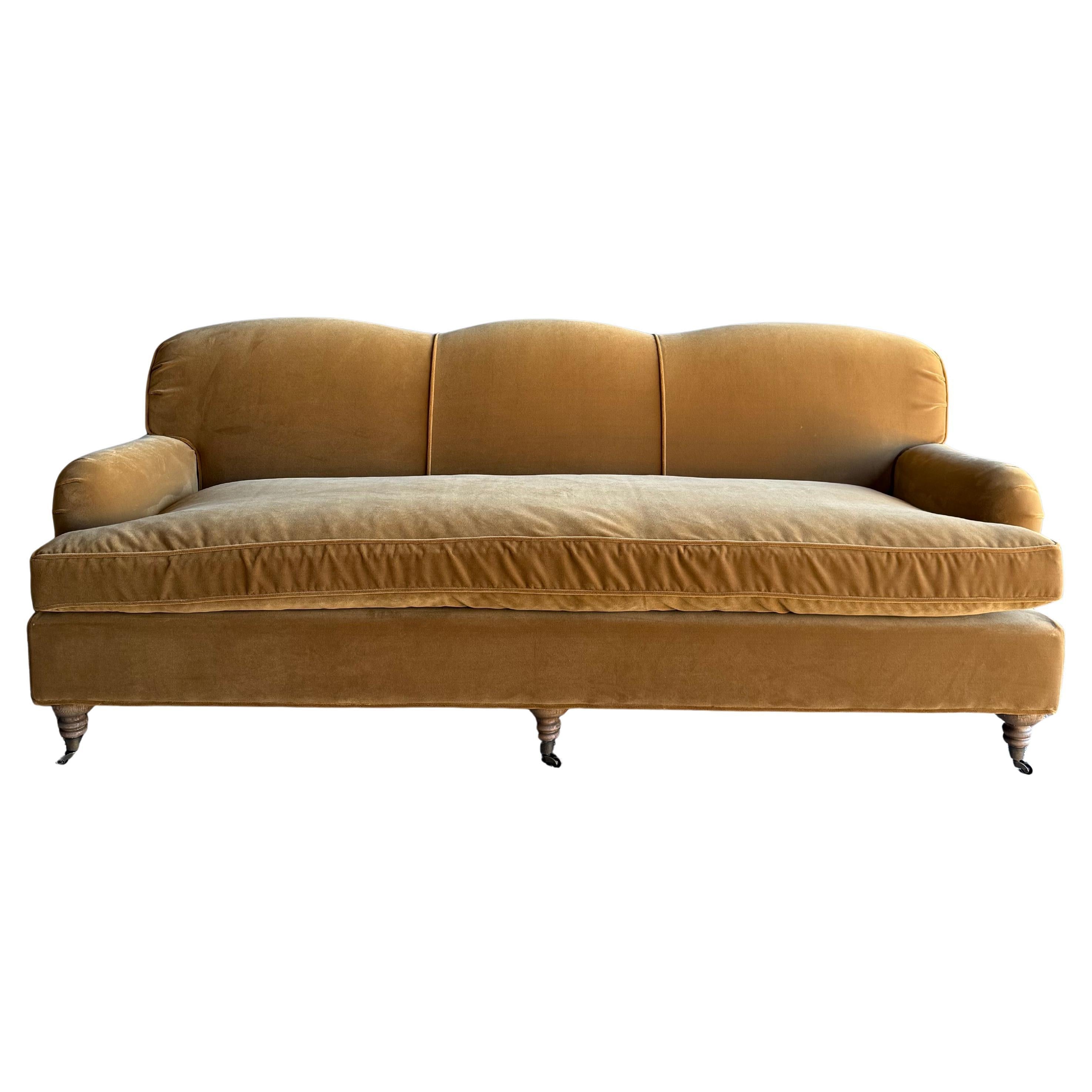 https://a.1stdibscdn.com/modern-english-sofa-in-a-caramel-mustard-faux-velvet-mohair-with-down-cushion-for-sale/f_18223/f_478269521764805966571/f_47826952_1764805967491_bg_processed.jpg