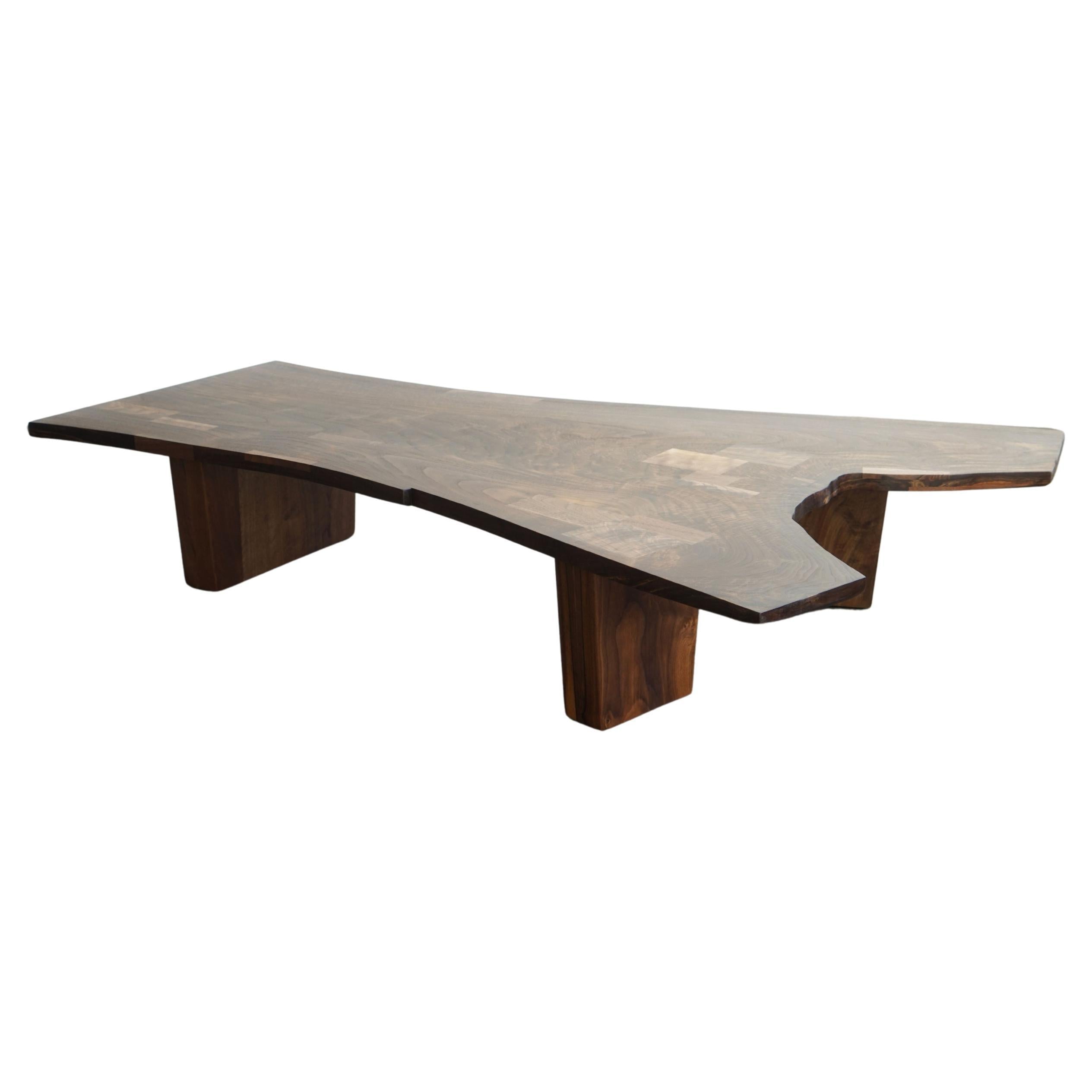 https://a.1stdibscdn.com/claro-walnut-slab-modern-coffee-table-by-last-workshop-70-for-sale/f_73622/f_479309721765334667307/f_47930972_1765334667896_bg_processed.jpg