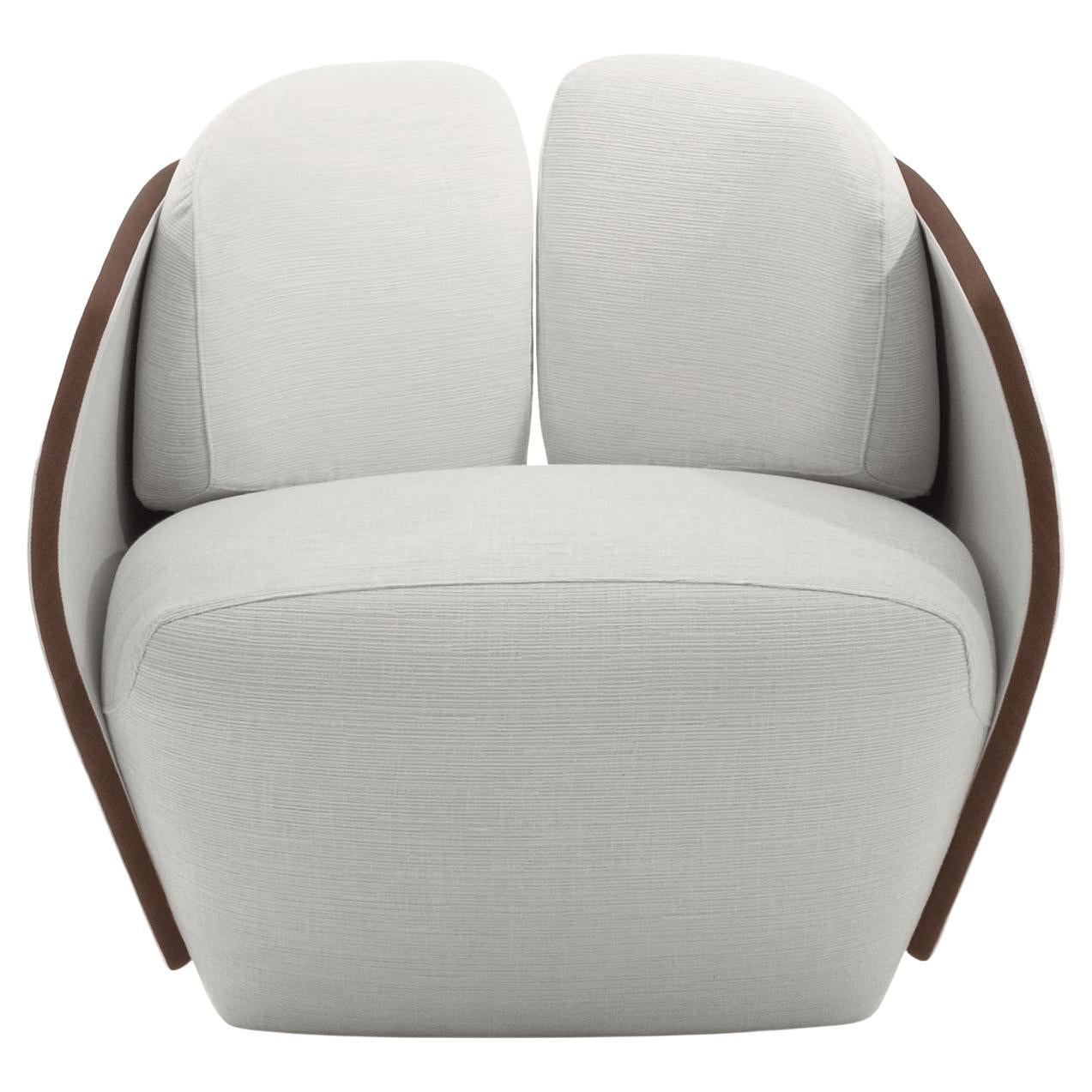 https://a.1stdibscdn.com/lorelei-white-fabric-and-leather-armchair-for-sale/f_17062/f_479619221765533200885/f_47961922_1765533201223_bg_processed.jpg