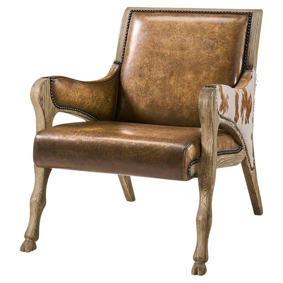 https://a.1stdibscdn.com/rustic-western-leather-hide-accent-chair-for-sale/0/f_480696821766260284869/f_48069682_1766260285153_bg_processed.jpg
