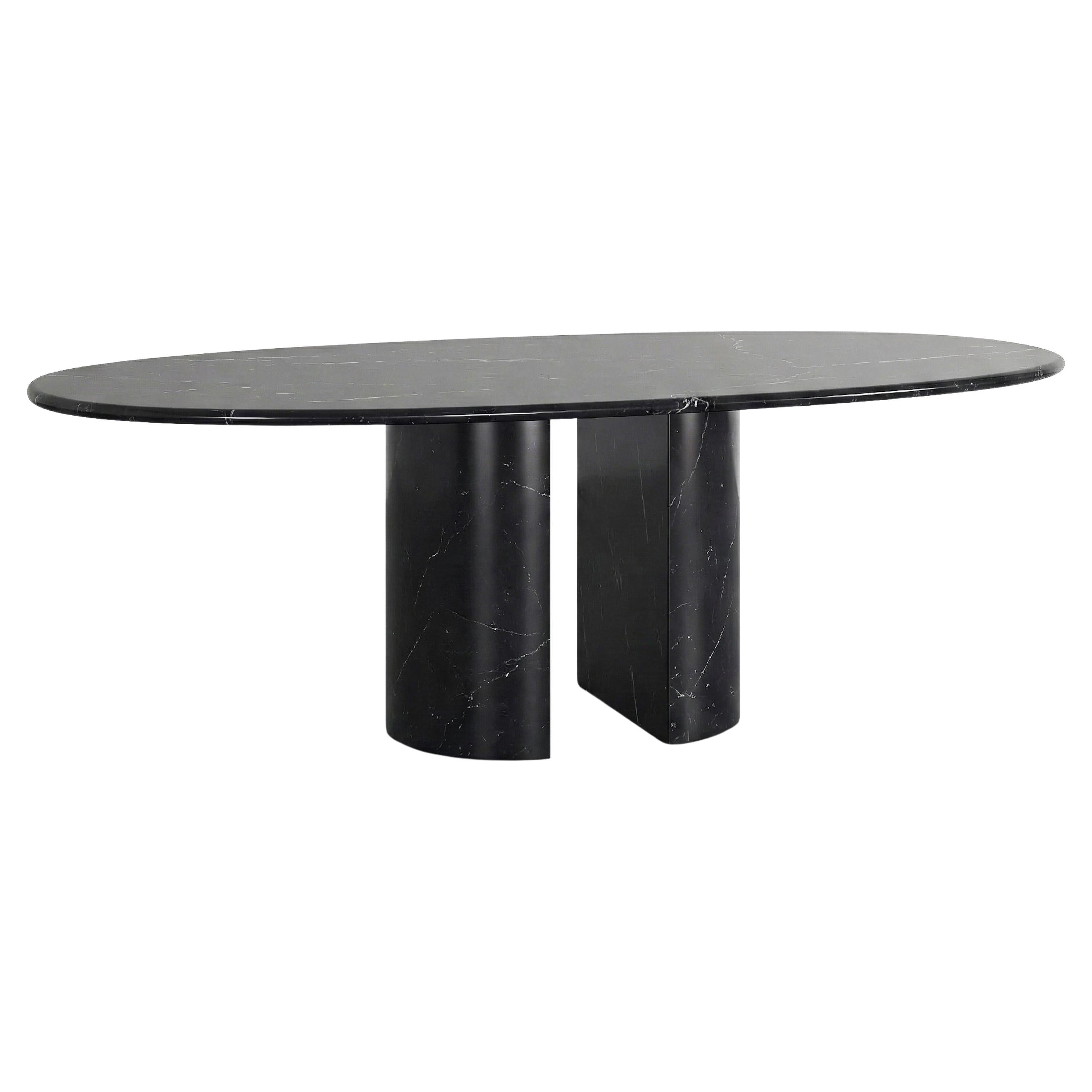 https://a.1stdibscdn.com/alexander-black-marble-dining-table-oval-customizable-marble-table-for-sale/f_91932/f_483337221768470393634/f_48333722_1768470394386_bg_processed.jpg