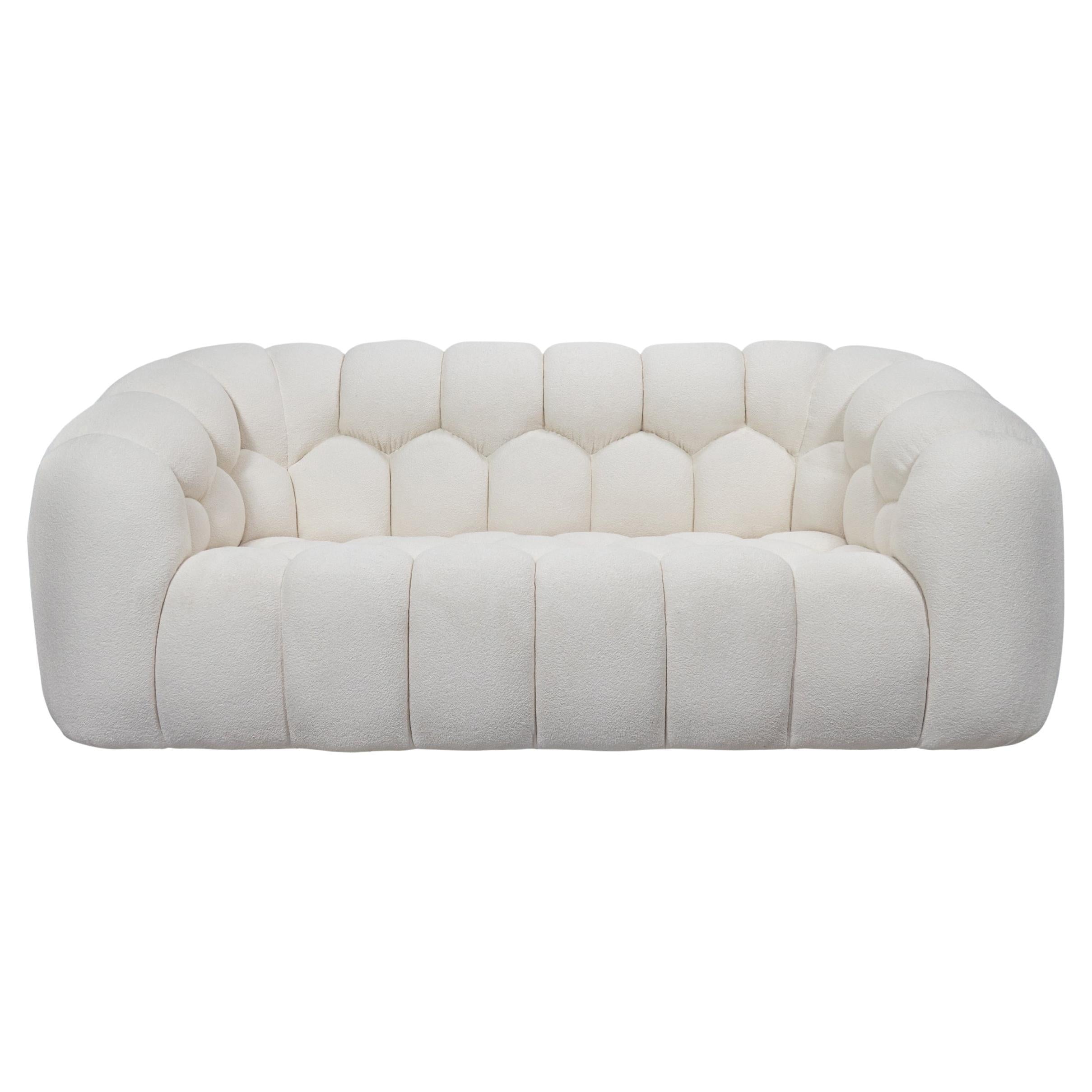 https://a.1stdibscdn.com/curved-boucle-bubble-style-sofa-with-paneled-upholstery-for-sale/f_21233/f_484344221769018082610/f_48421642_1768949426536_bg_processed.jpg