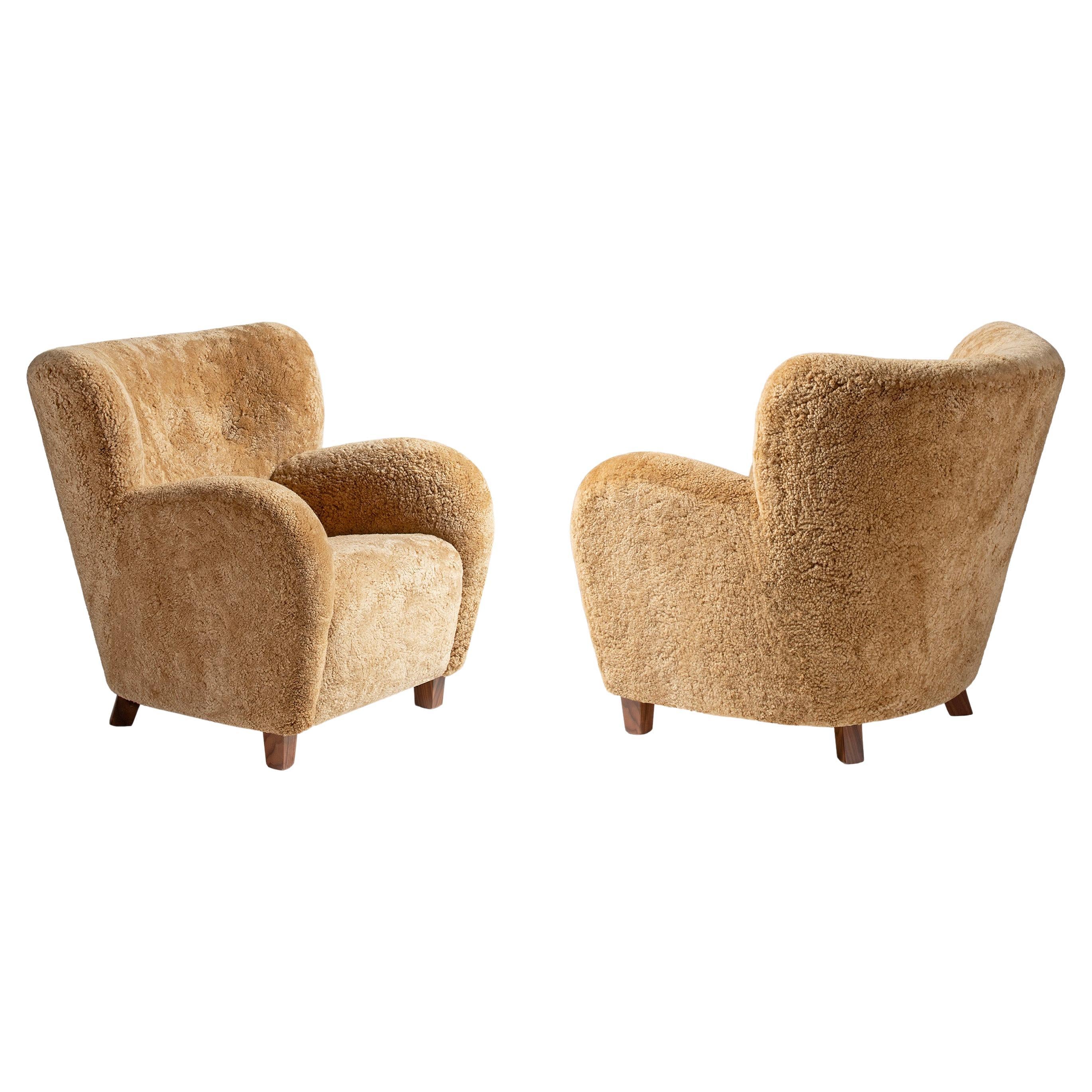 https://a.1stdibscdn.com/pair-of-karu-lounge-chairs-in-maple-sheepskin-by-dagmar-for-sale/f_13332/f_485419921769549152752/f_48541992_1769549153660_bg_processed.jpg