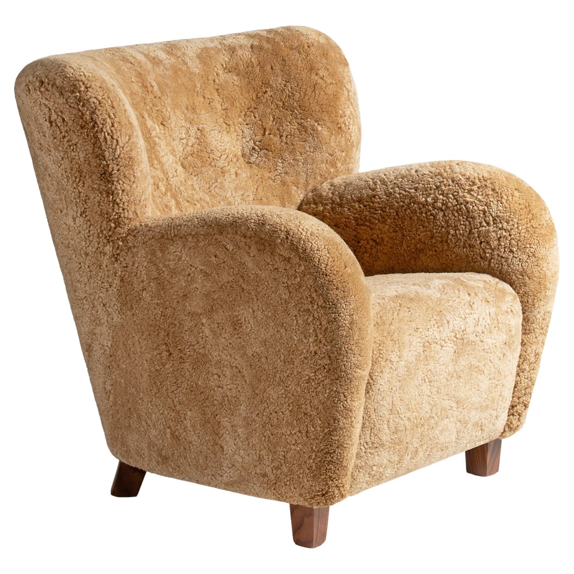 https://a.1stdibscdn.com/karu-lounge-chair-in-maple-sheepskin-by-dagmar-for-sale/f_13332/f_485420721769550006463/f_48542072_1769550007149_bg_processed.jpg