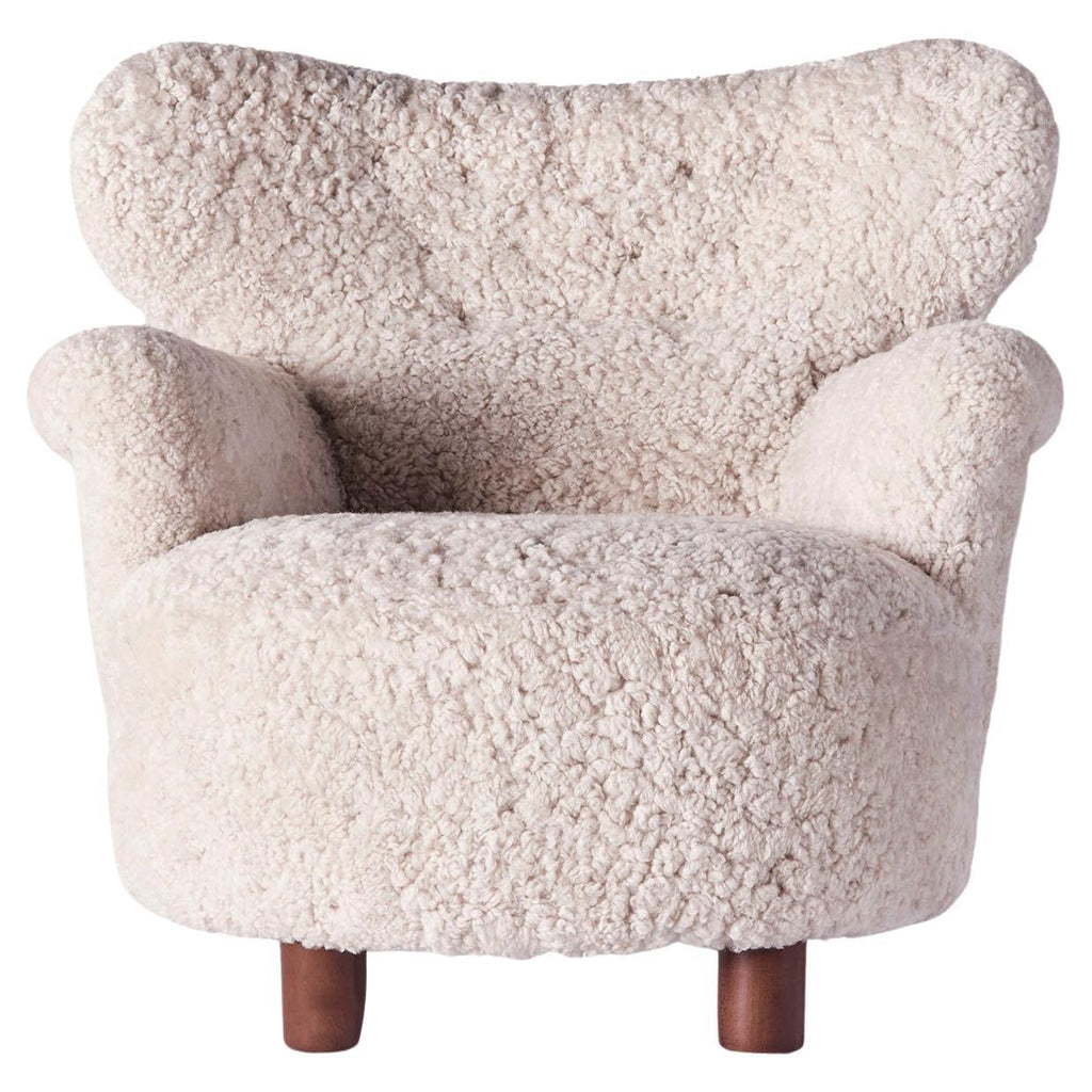 https://a.1stdibscdn.com/sheepskin-upholstered-armchair-by-elias-svedberg-model-elias-for-sale/f_58912/f_488379521771275850252/f_48837952_1771275850666_bg_processed.jpg