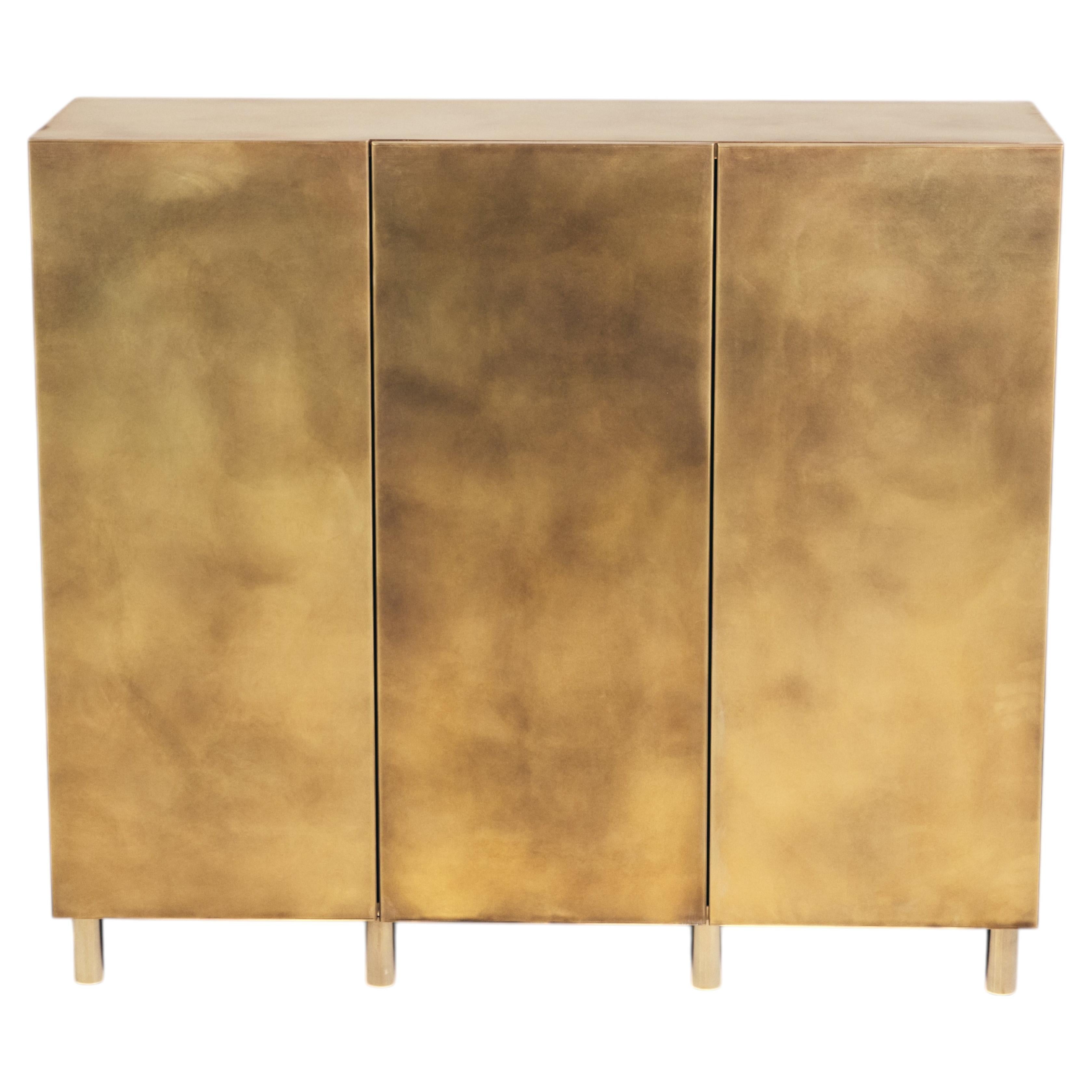 https://a.1stdibscdn.com/baron-3-door-storage-cabinet-patinated-brass-made-in-britain-by-novocastrian-for-sale/f_25883/f_489444021771865897918/f_48944402_1771865898441_bg_processed.jpg