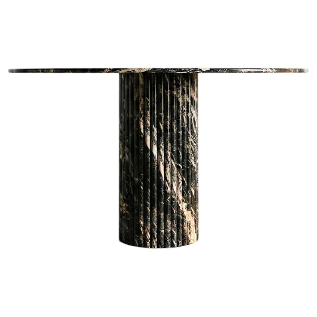https://a.1stdibscdn.com/sculptural-nero-picasso-marble-fluted-base-round-table-for-sale/f_91932/f_490563521772546618155/f_49056352_1772546618206_bg_processed.jpg