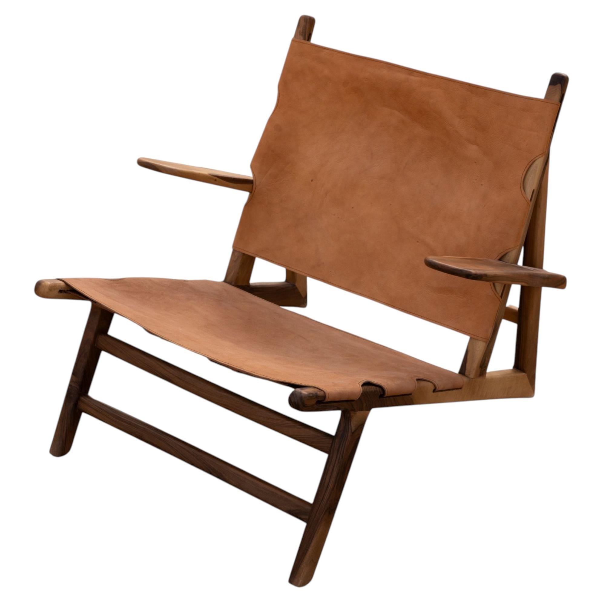 https://a.1stdibscdn.com/joshua-armchair-in-walnut-and-leather-for-sale/f_30933/f_490585821772555024770/f_49058582_1772555024948_bg_processed.jpg