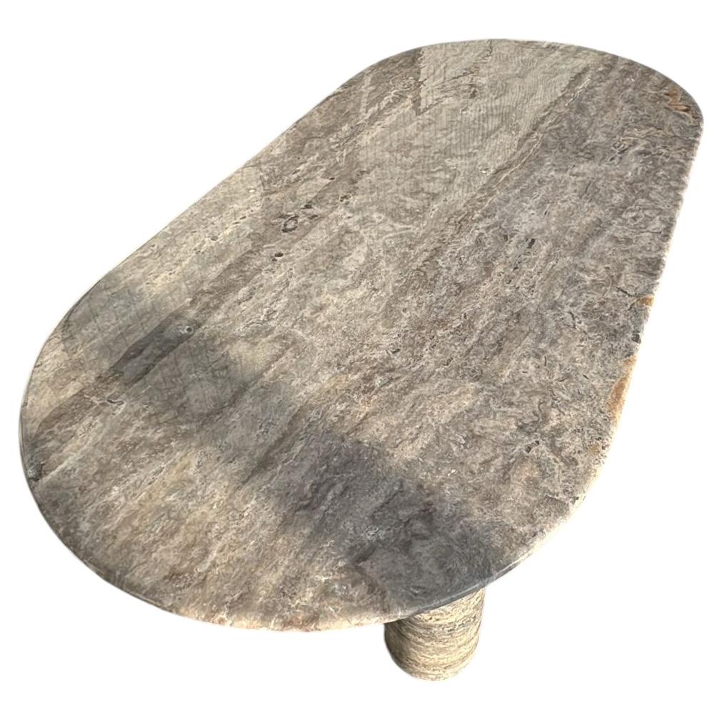 https://a.1stdibscdn.com/custom-oval-silver-travertine-marble-dining-table-stone-kitchen-tablle-for-sale/f_91932/f_490694021772632793543/f_49069402_1772632793601_bg_processed.jpg