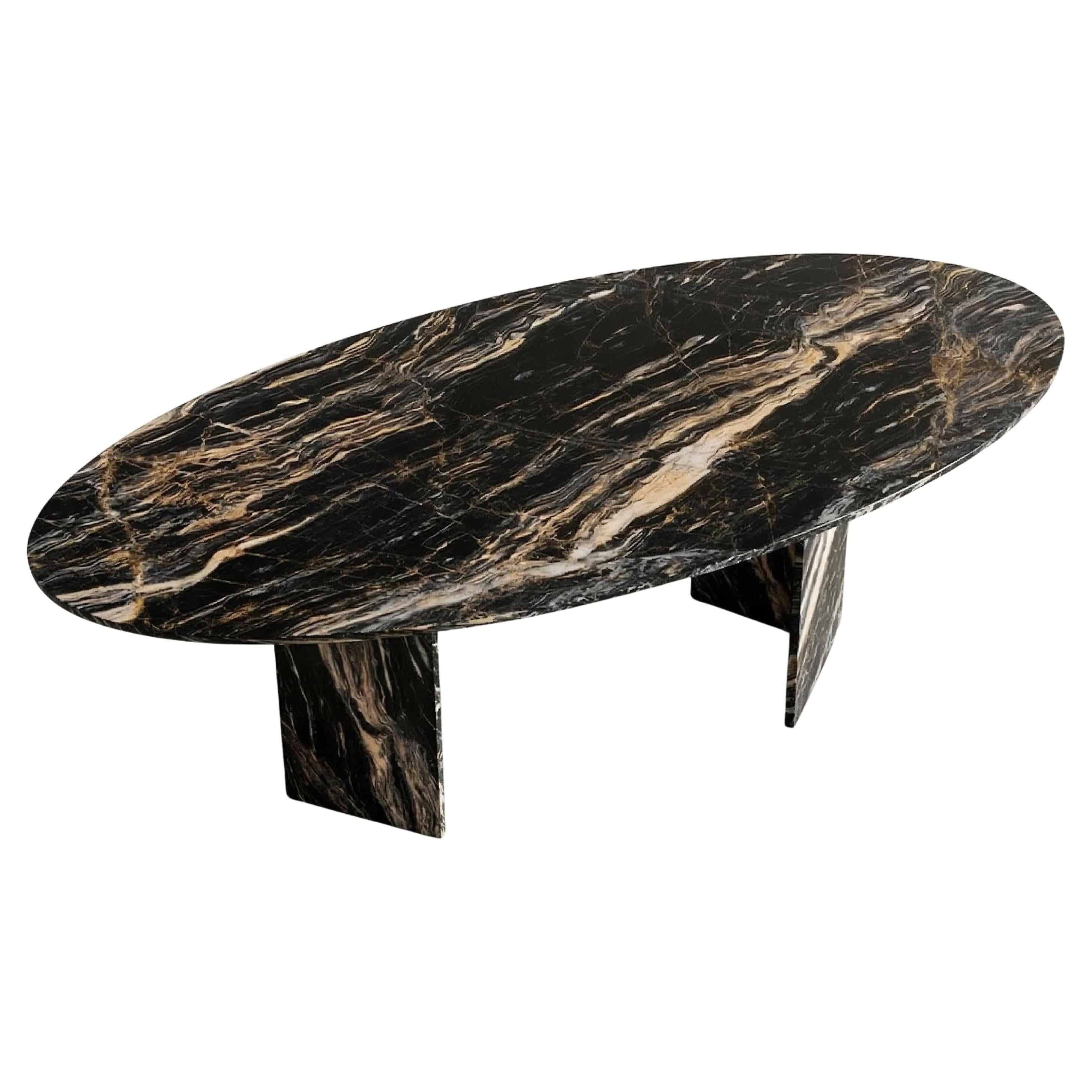 https://a.1stdibscdn.com/sculptural-nero-picasso-artistic-marble-oval-dining-table-72-x-36-handmade-for-sale/f_91932/f_492065521773400950970/f_49206552_1773400951873_bg_processed.jpg