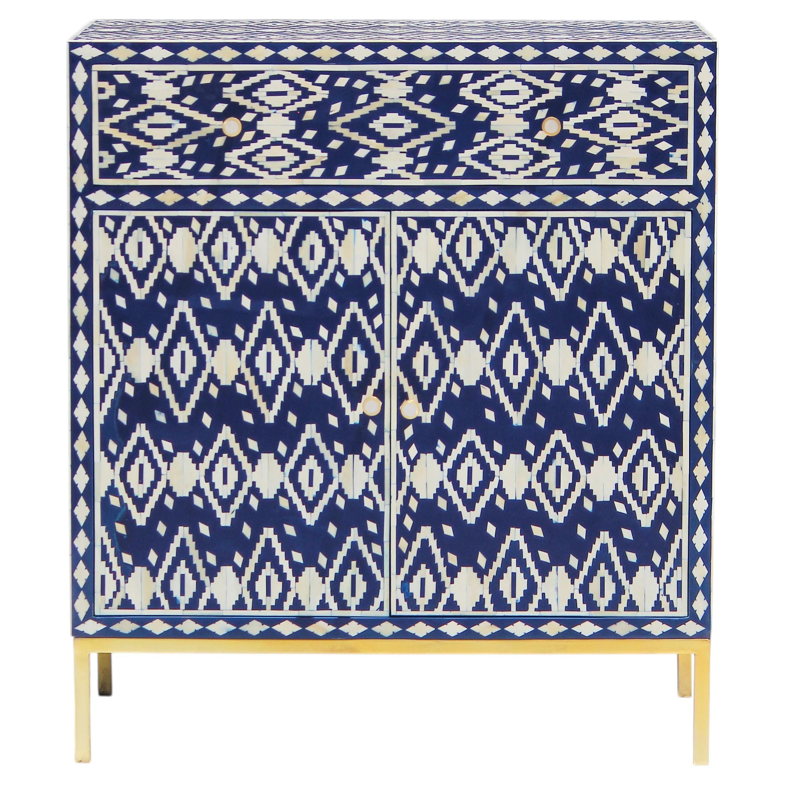 https://a.1stdibscdn.com/navy-blue-spiral-leaf-bone-inlay-buffet-with-gold-legs-by-house-of-jaipur-for-sale/f_97222/f_494228221774787443832/f_49422822_1774787444161_bg_processed.jpg