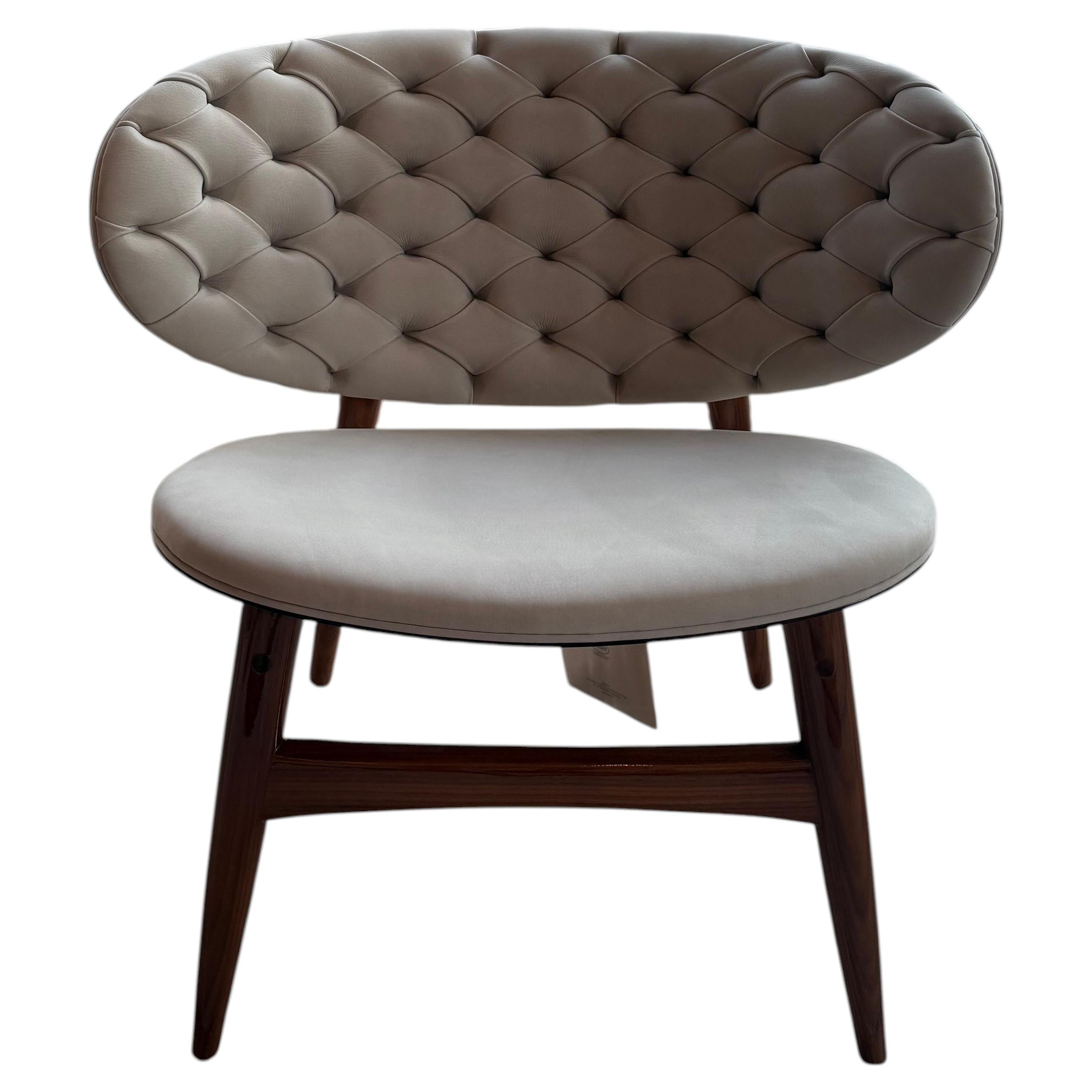 https://a.1stdibscdn.com/baxter-dalma-armchair-by-draga-aurel-tufted-leather-wood-for-sale/f_108682/f_494480021774996153335/f_49448002_1774996153630_bg_processed.jpg