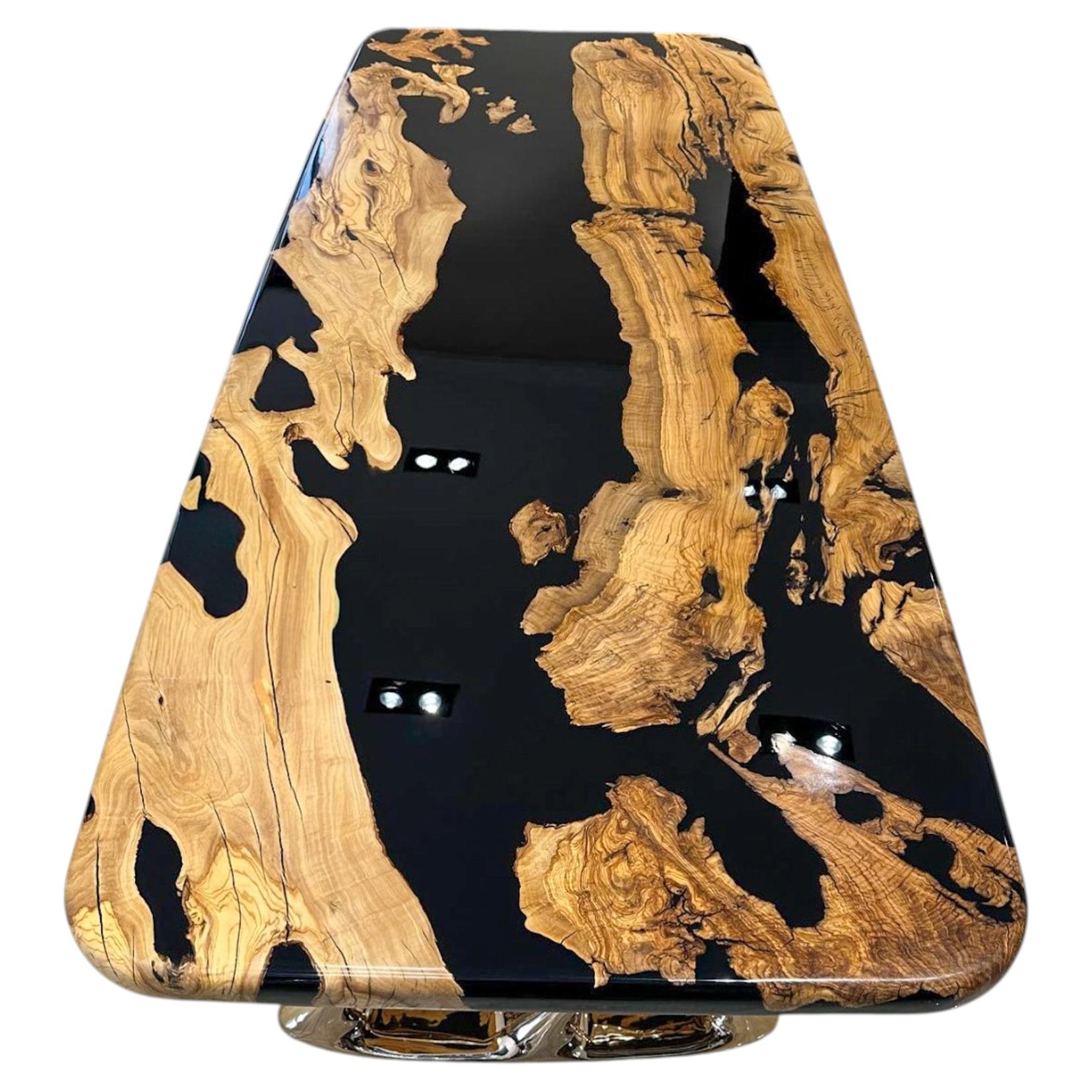 https://a.1stdibscdn.com/custom-live-edge-olive-wood-crystal-clear-epoxy-resin-dining-table-for-sale/f_91932/f_495753821775653083489/f_49575382_1775653083640_bg_processed.jpg