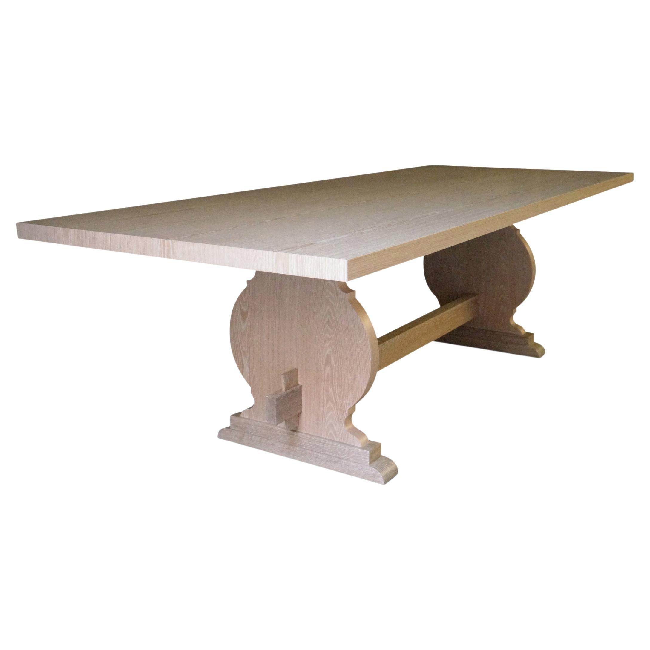 https://a.1stdibscdn.com/manolo-basque-inspired-trestle-dining-table-in-cerused-oak-customizable-for-sale/f_25173/f_67729331643129882436/f_6772933_1643129882969_bg_processed.jpg