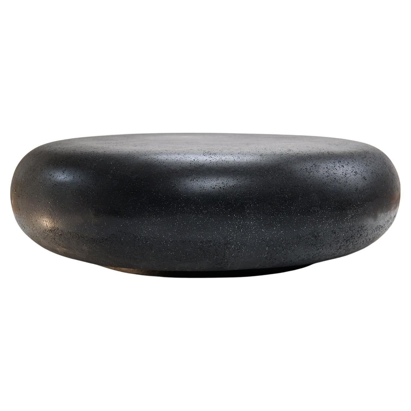 https://a.1stdibscdn.com/cast-resin-pebble-low-table-coal-stone-finish-by-zachary-a-design-for-sale/f_32531/f_97657611734367776151/f_9765761_1734367776474_bg_processed.jpg