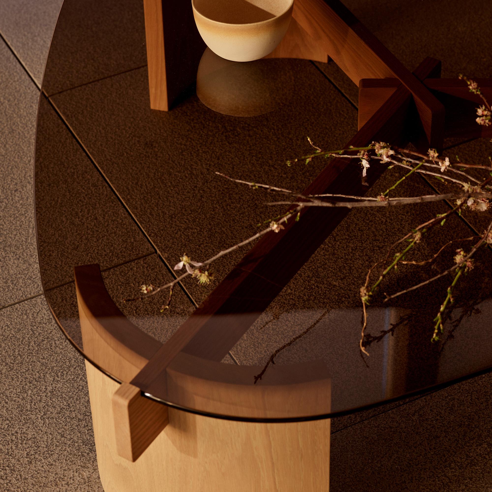 https://a.1stdibscdn.com/kita-living-flow-coffee-table-large-bronze-glass-for-sale-picture-3/f_89002/f_472709421765442994582/flow_coffee_table_large_bronze_2_master.jpg