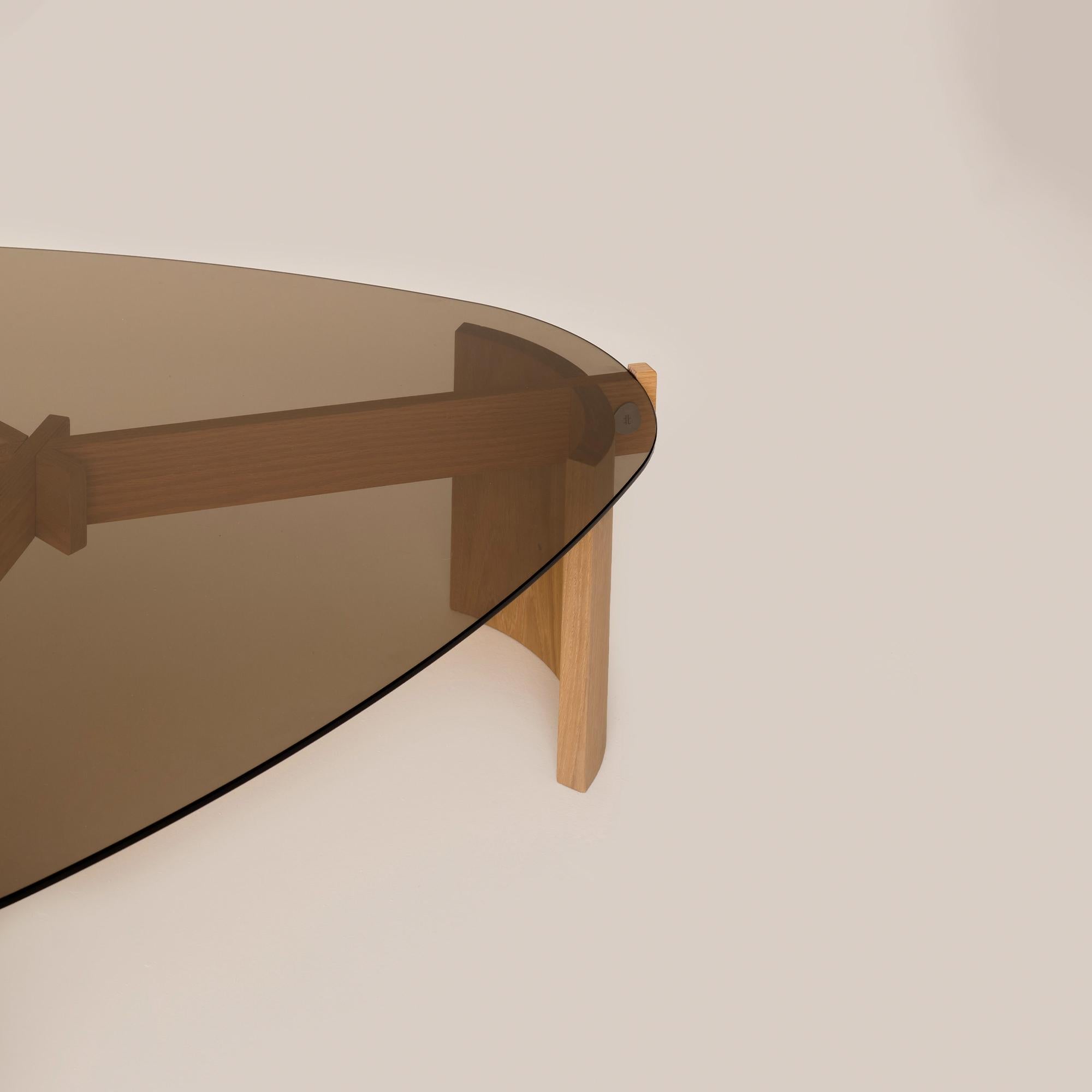 https://a.1stdibscdn.com/kita-living-flow-coffee-table-large-bronze-glass-for-sale-picture-5/f_89002/f_472709421765443031206/flow_coffee_table_large_bronze_4_1_master.jpg