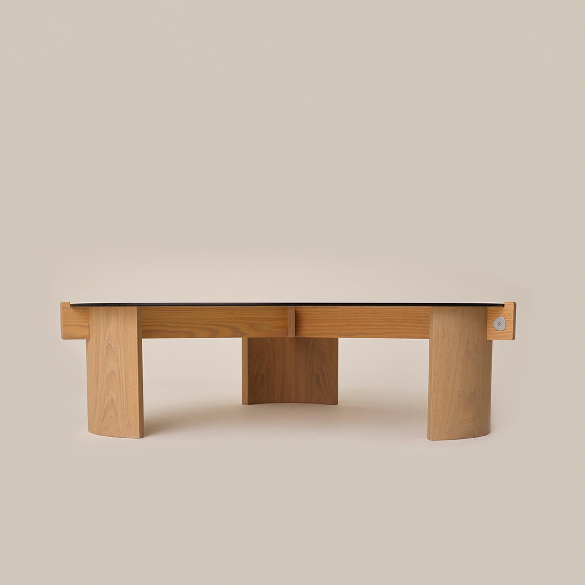 https://a.1stdibscdn.com/kita-living-flow-coffee-table-large-bronze-glass-for-sale-picture-6/f_89002/f_472709421765443031046/flow_coffee_table_large_bronze_4_master.jpg